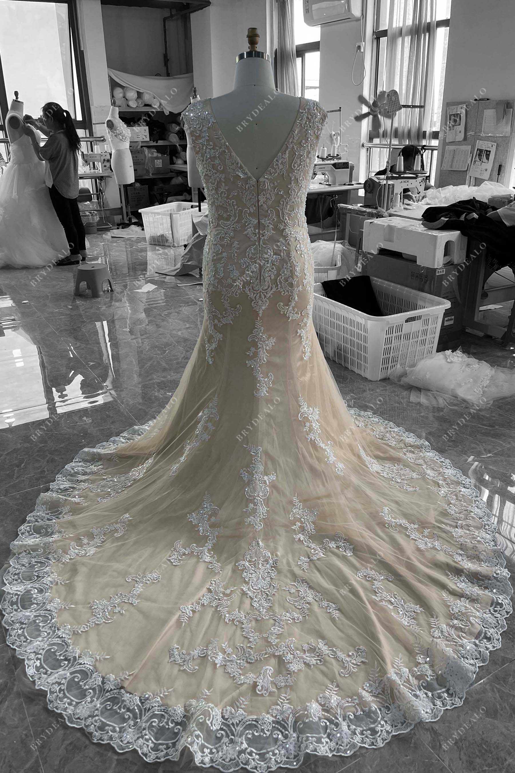 V-back sleeveless long train wedding gown