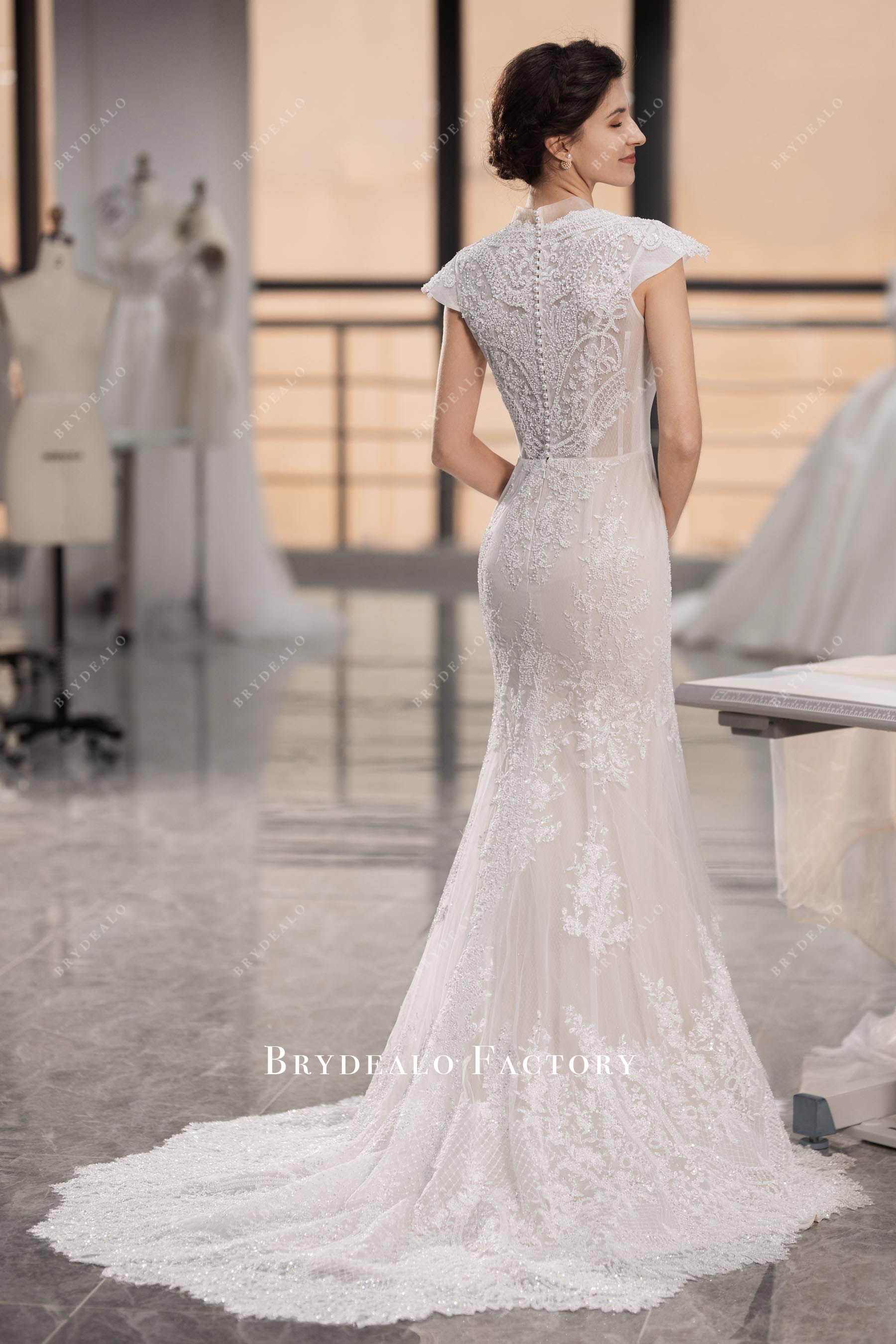 beaded lace cutout train wedding dress