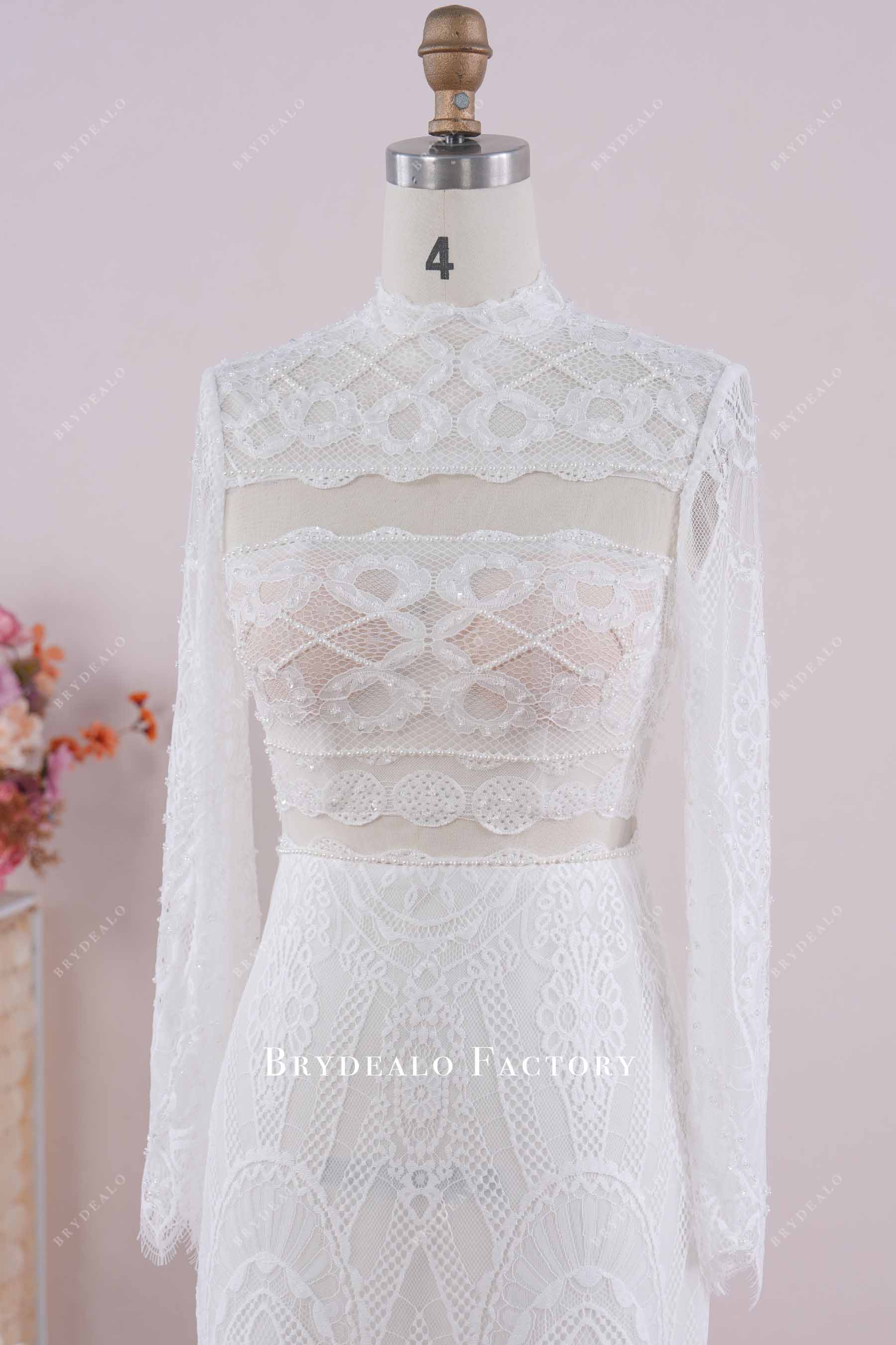 beaded sleeved lace wedding dress