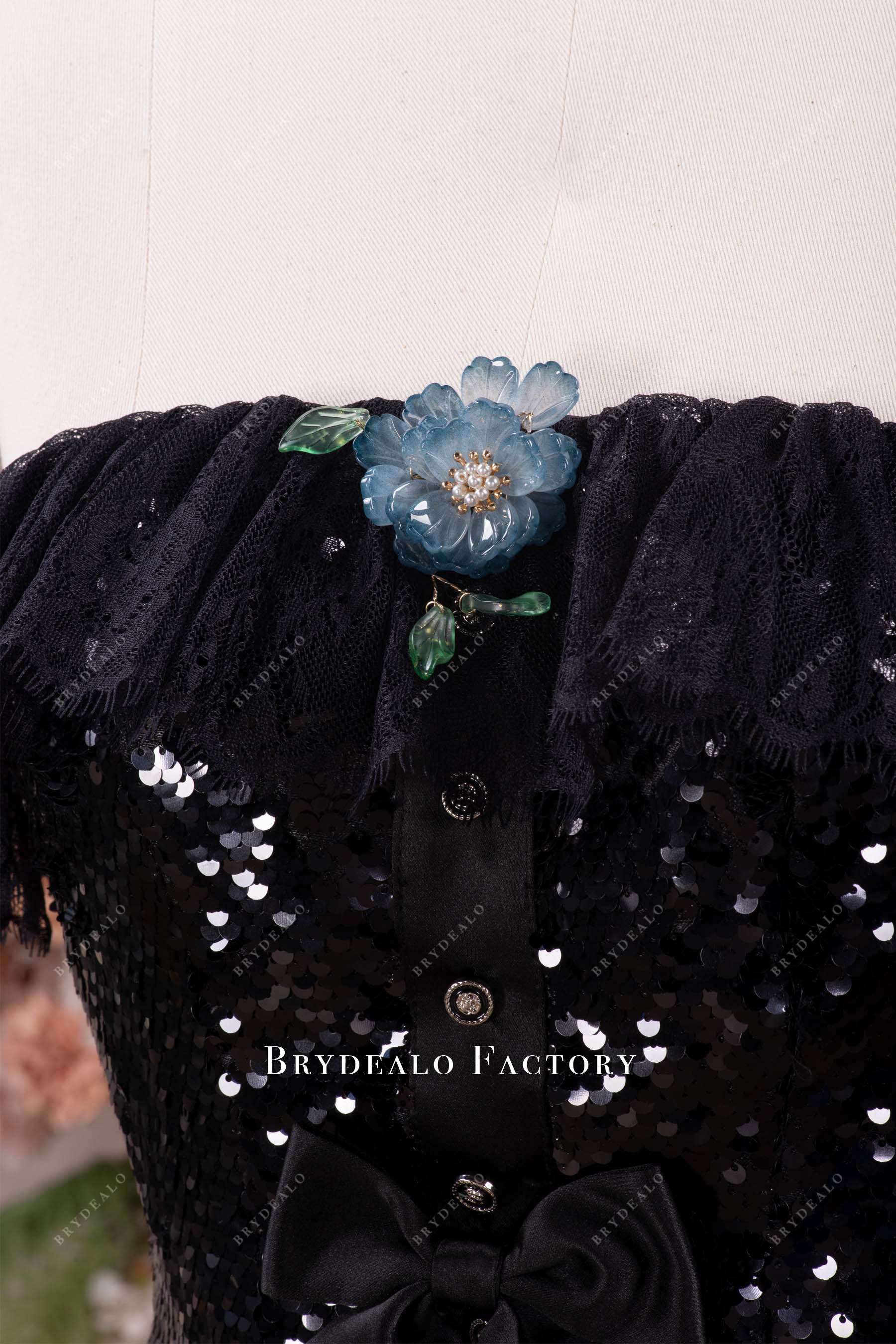 blue flower brooch evening dress