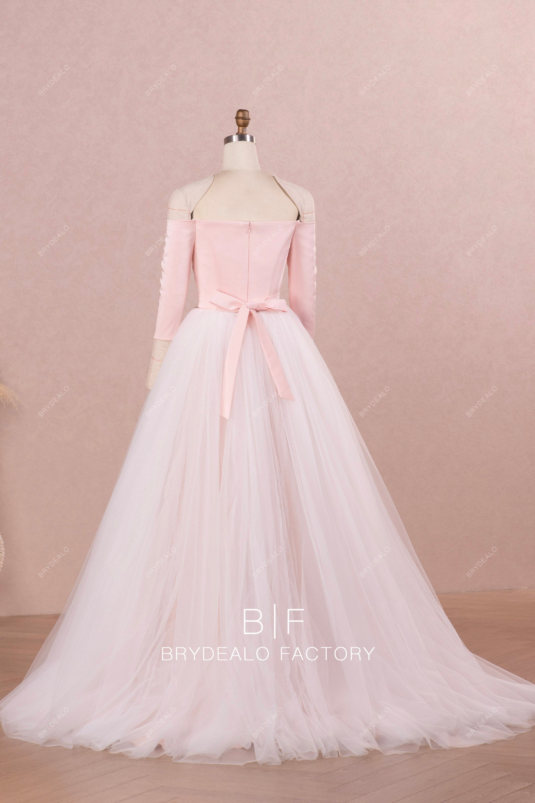 blush sleeved wedding dress with detachable tulle overskirt