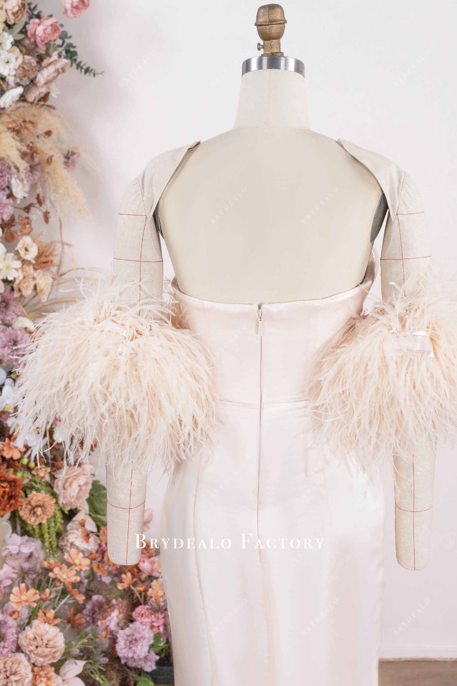 blushing ostrich feather sleeve prom dress