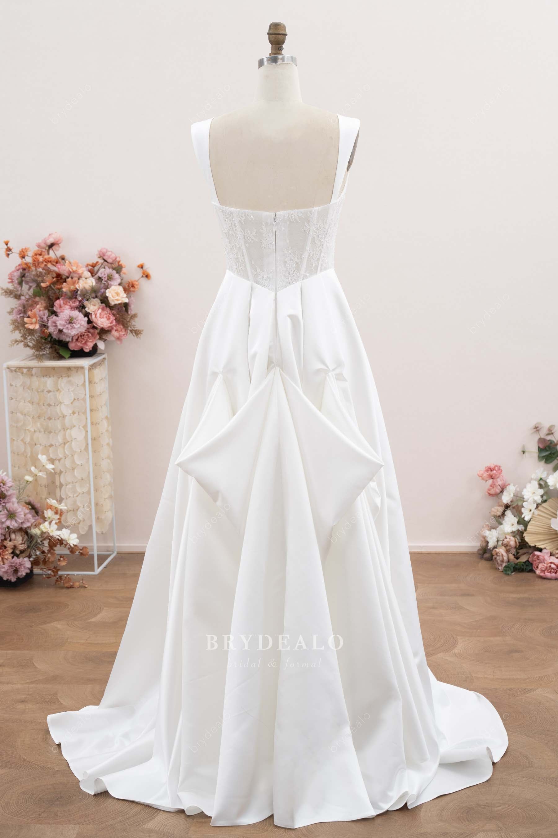 bustled satin wedding dress