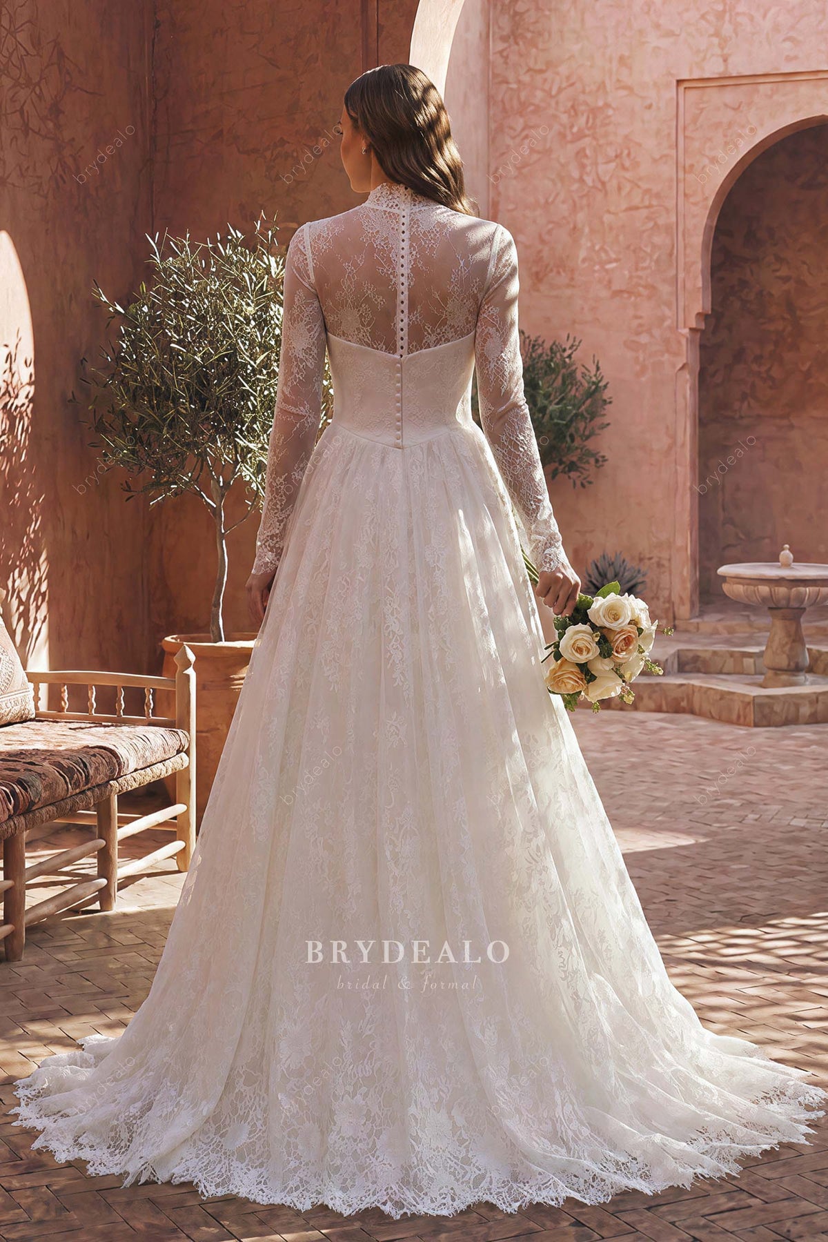 buttoned back lace wedding dress