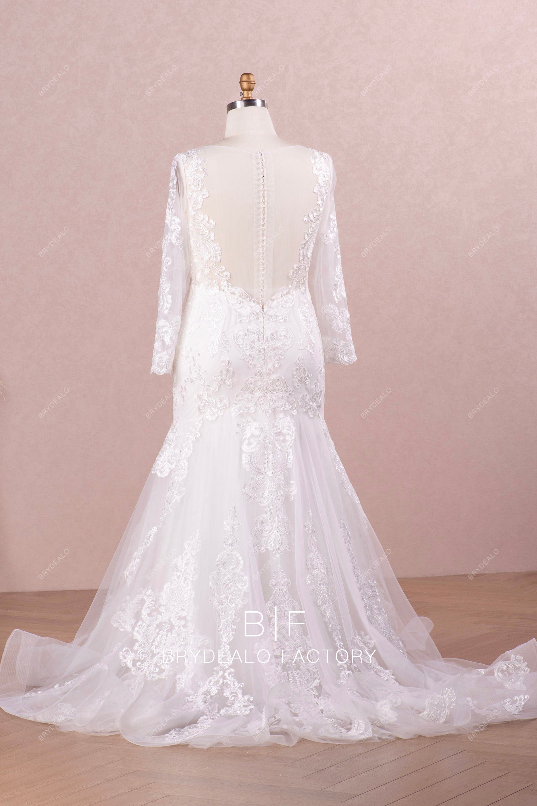 buttoned illusion back ruffled long wedding dress