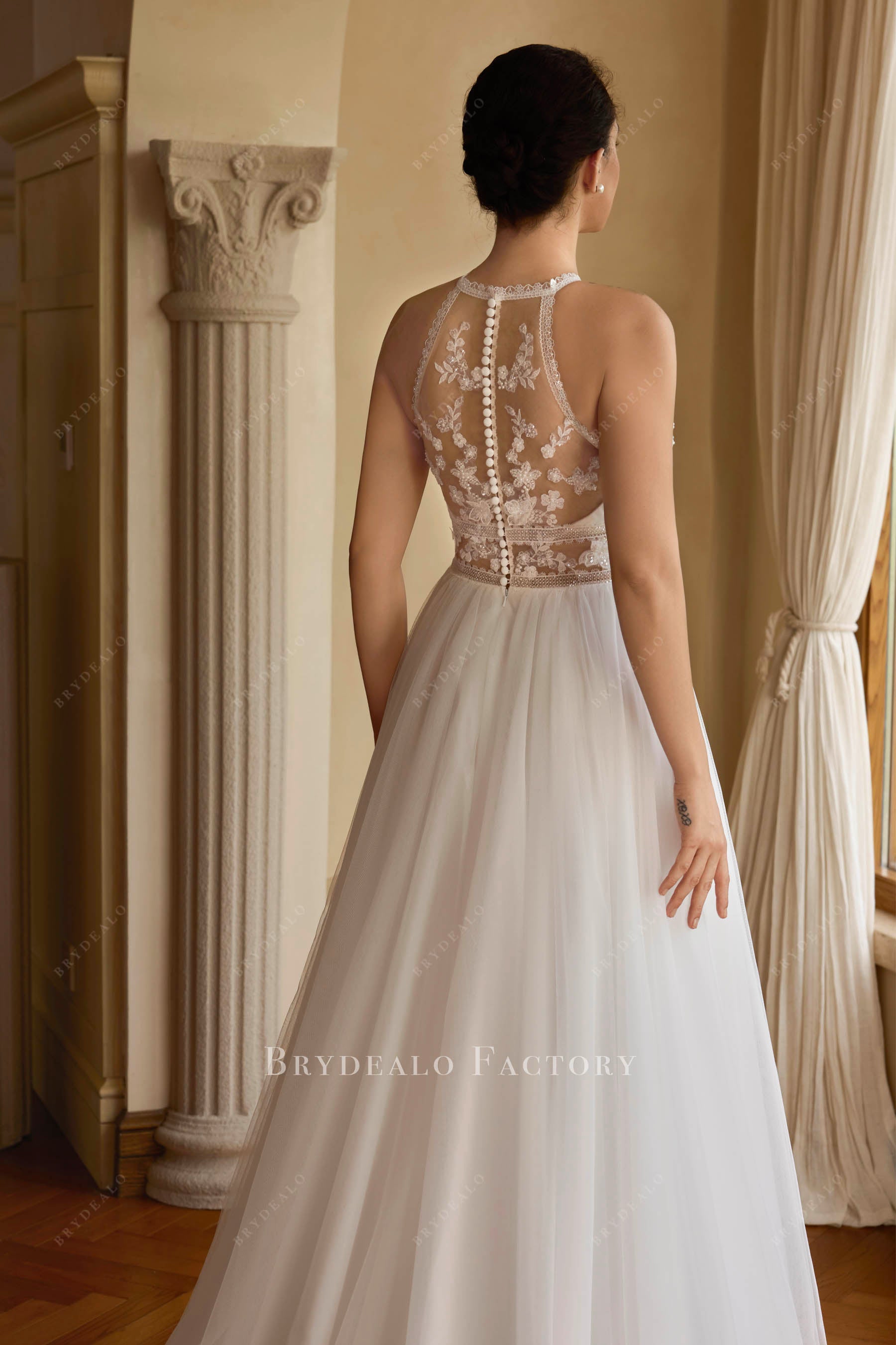 buttoned lace back boho bridal gown