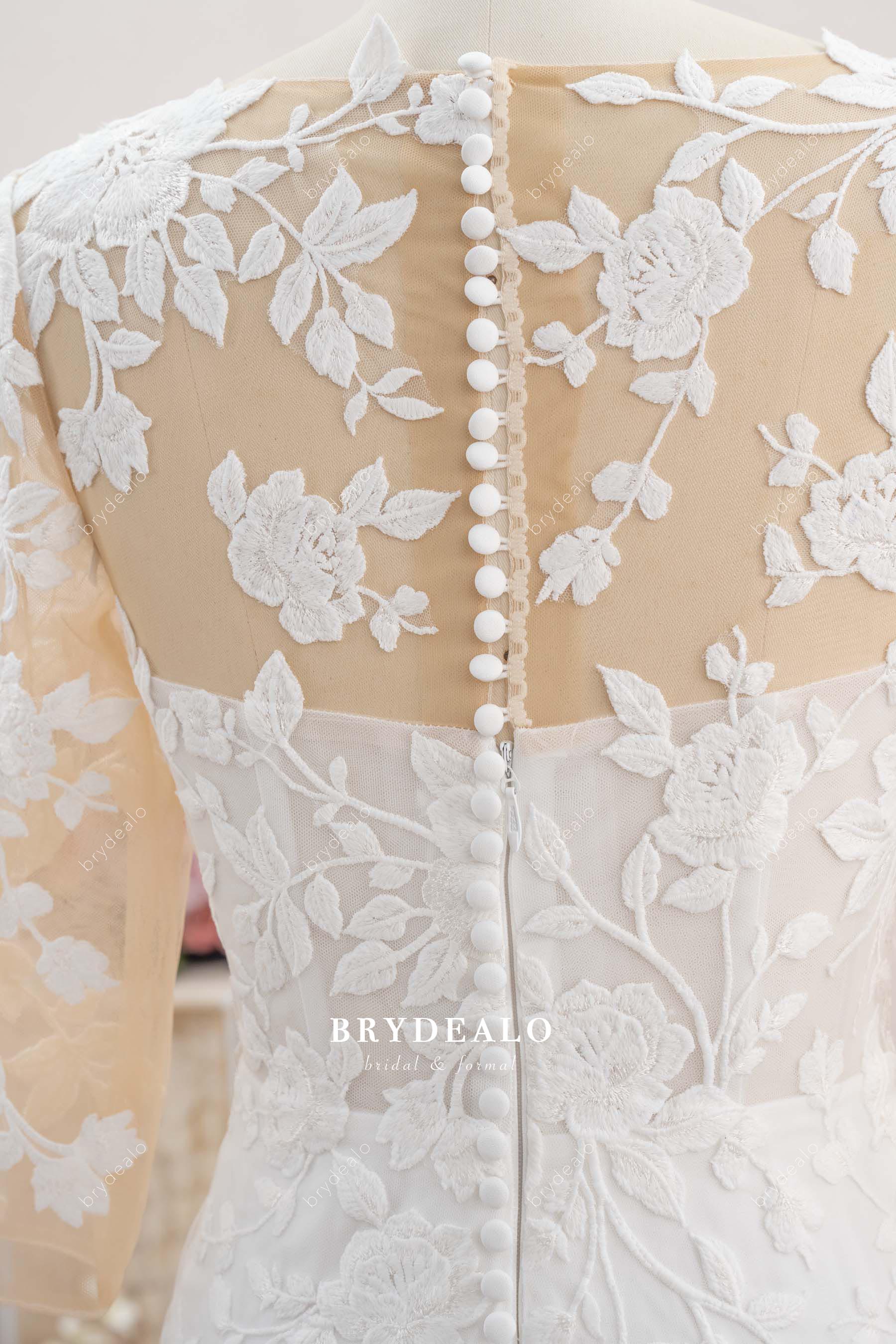 buttoned lace back wedding dress