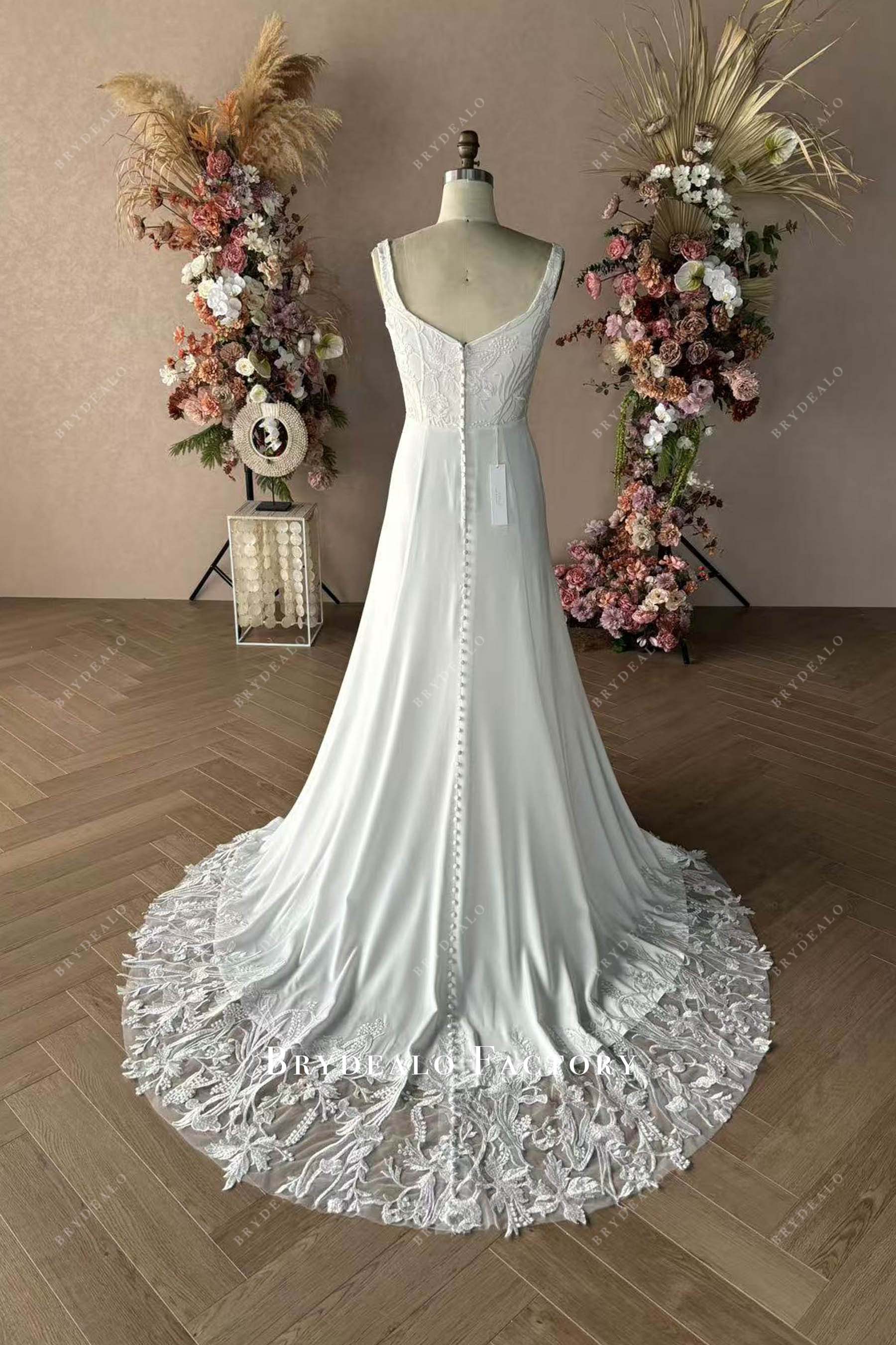 buttoned lace train wedding dress