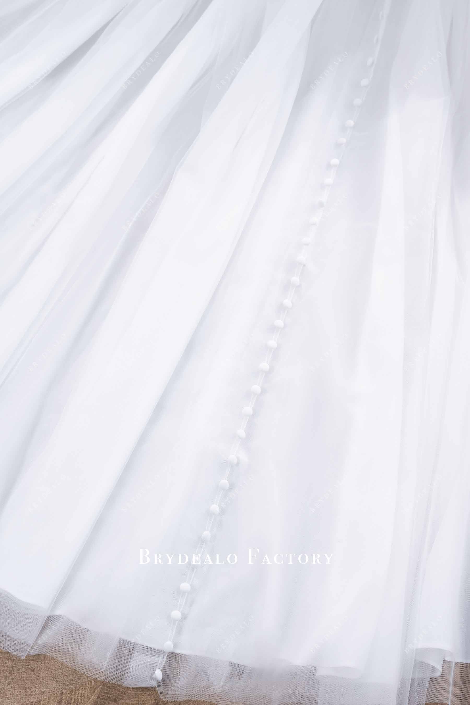 buttoned train tulle wedding dress