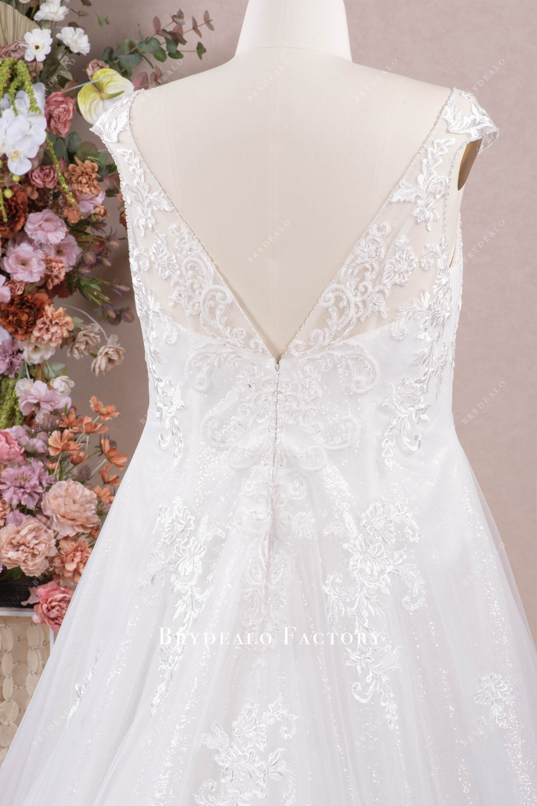 cap sleeve V-back wedding gown