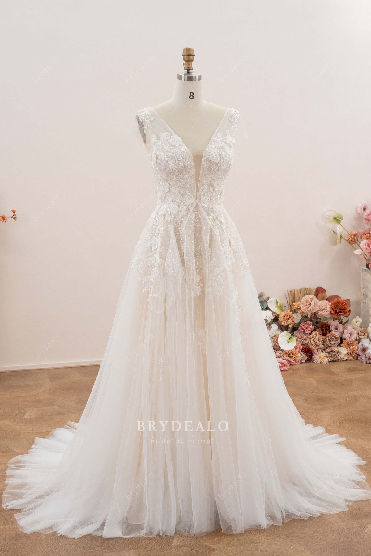 cap sleeve plunging lace wedding dress
