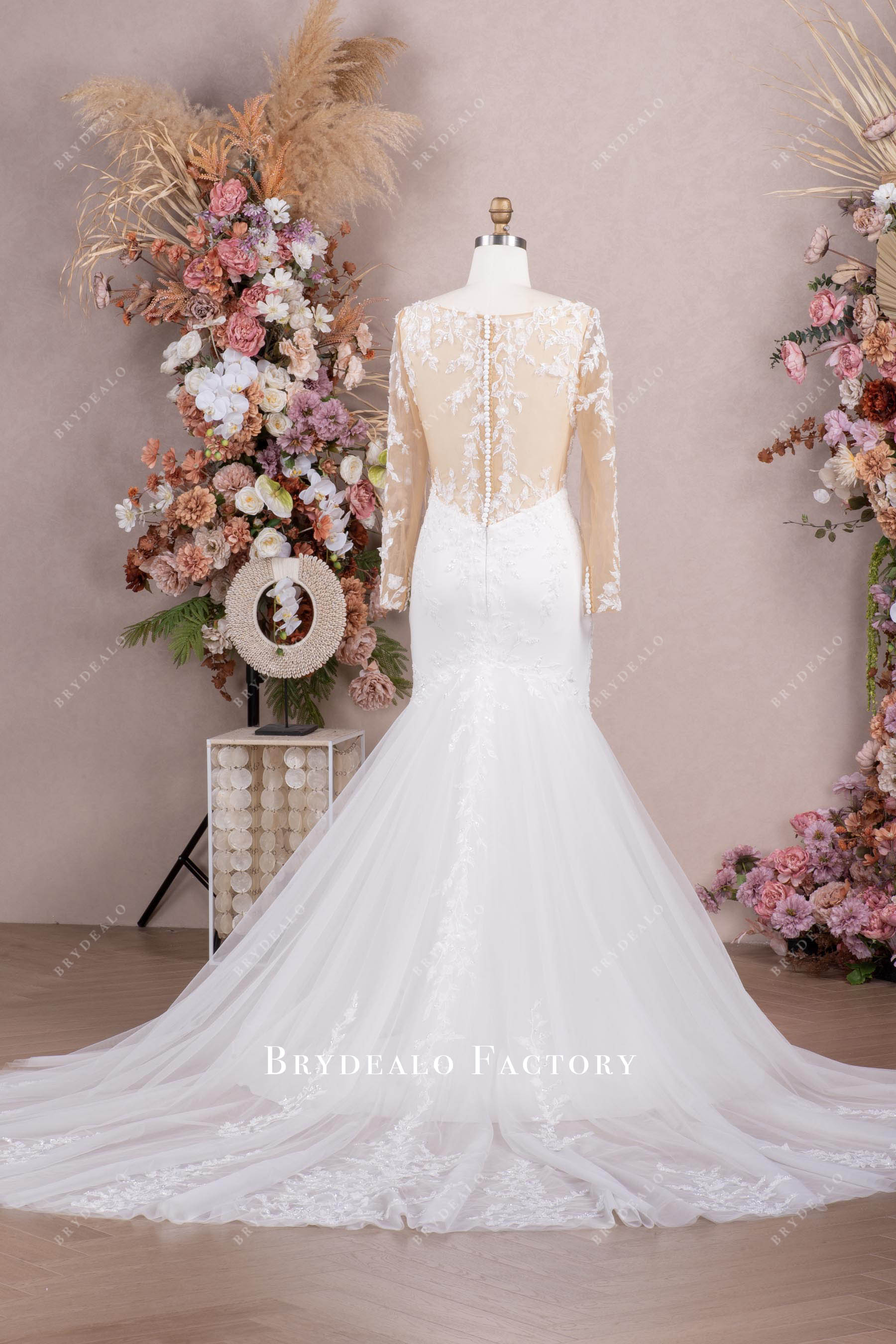 chapel train buttoned back mermaid bridal gown