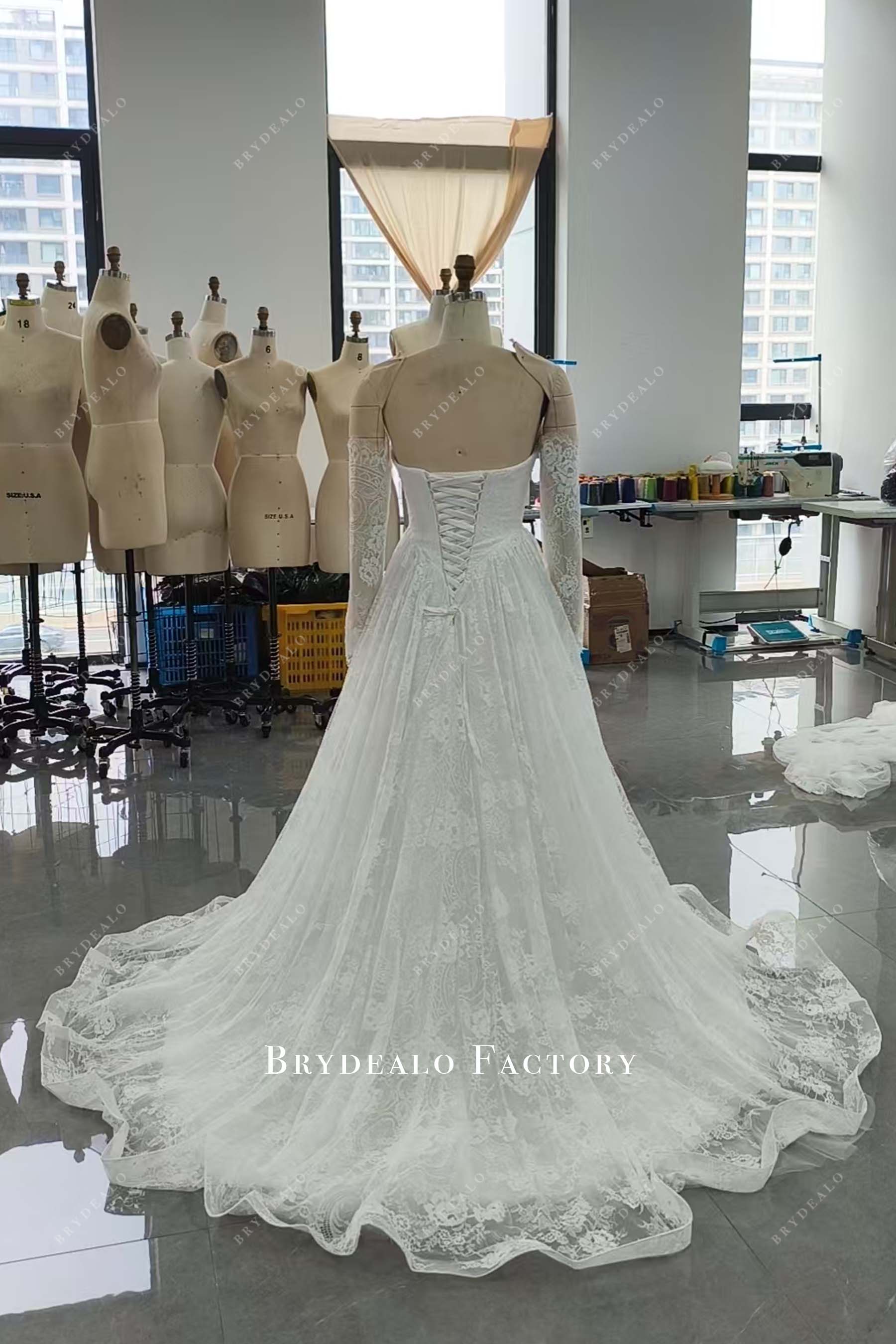 corset back ruffled train wedding dress