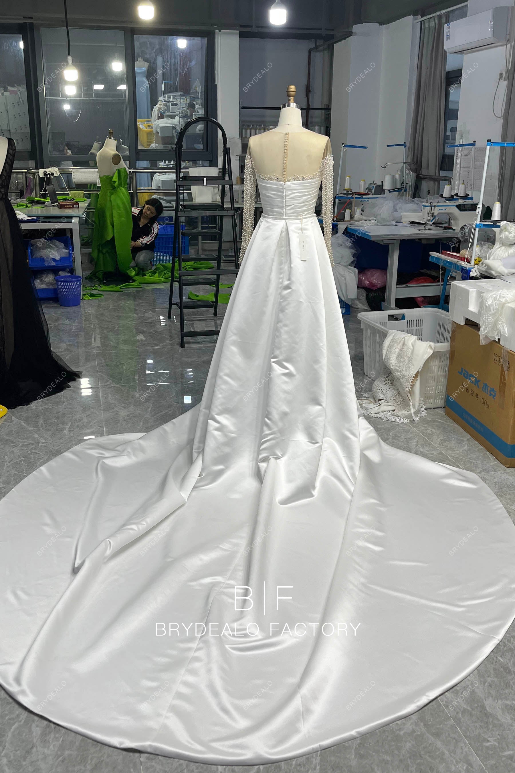 detachable overskirt long sleeve wedding gown