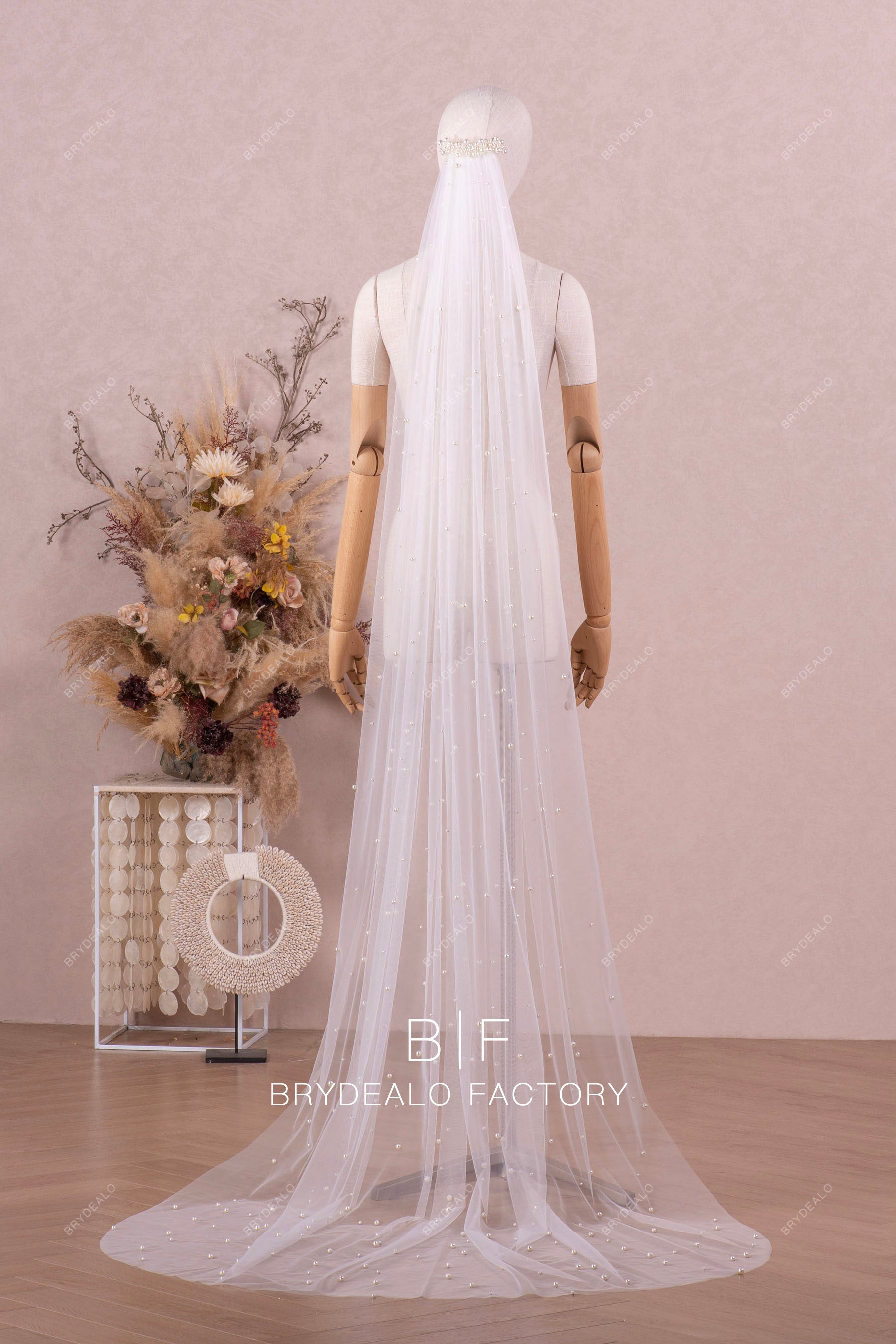 http://brydealofactory.com/cdn/shop/files/dreamy-pearl-chapel-length-wedding-veil-08168.jpg?v=1696842619&width=2048