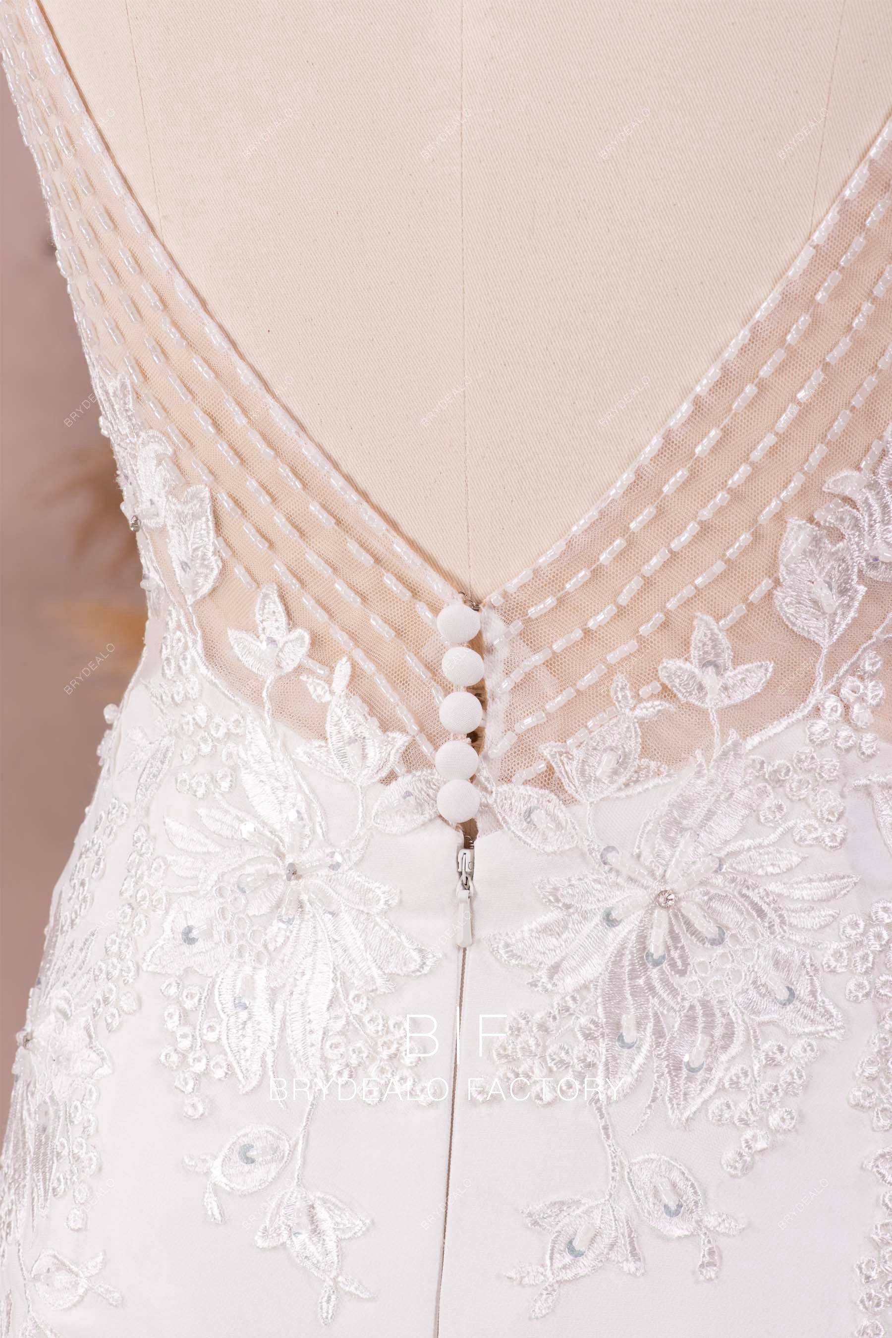 hand-sewn beaded illusion V-back wedding dress