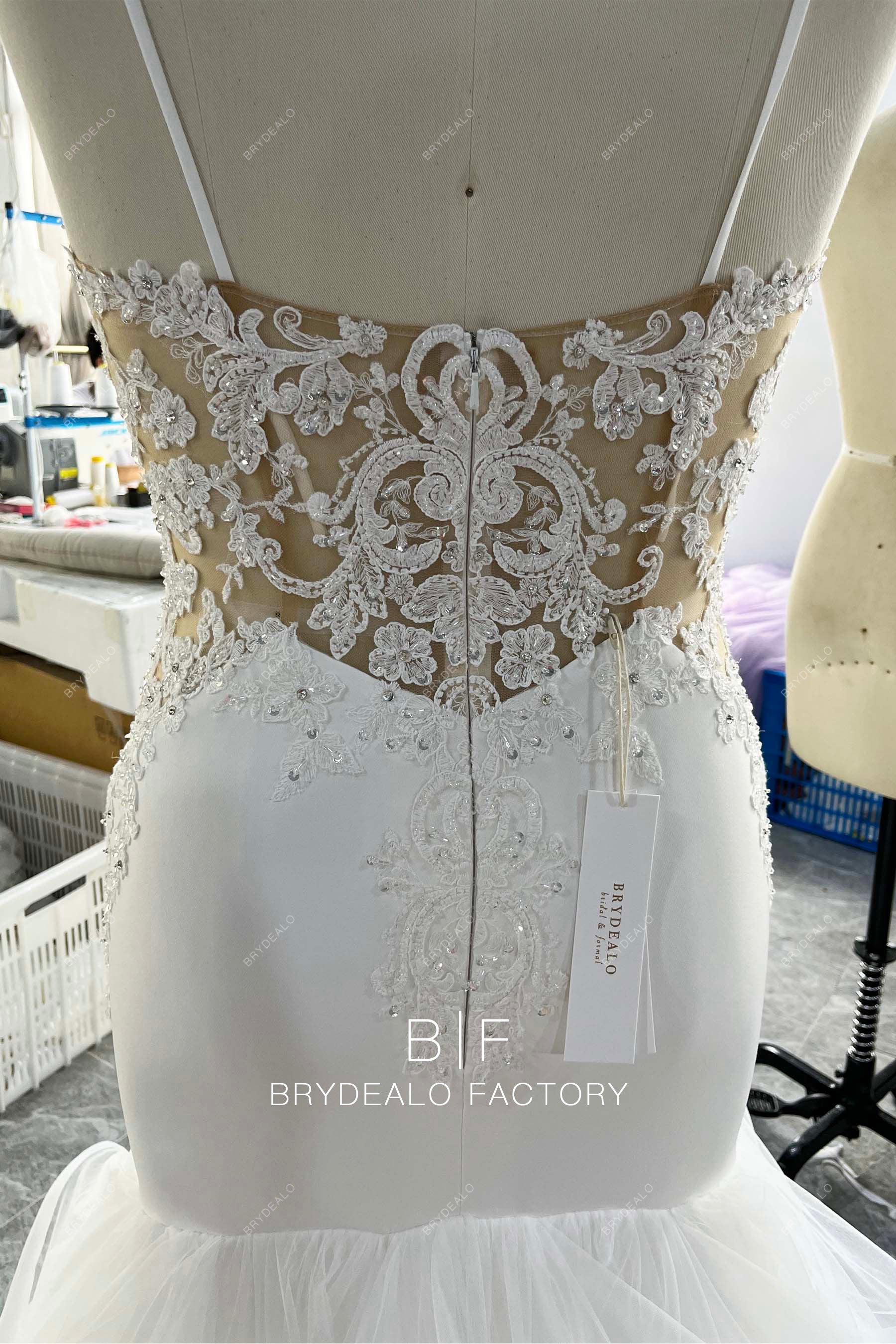 hand-sewn beaded lace cutout waist wedding dress