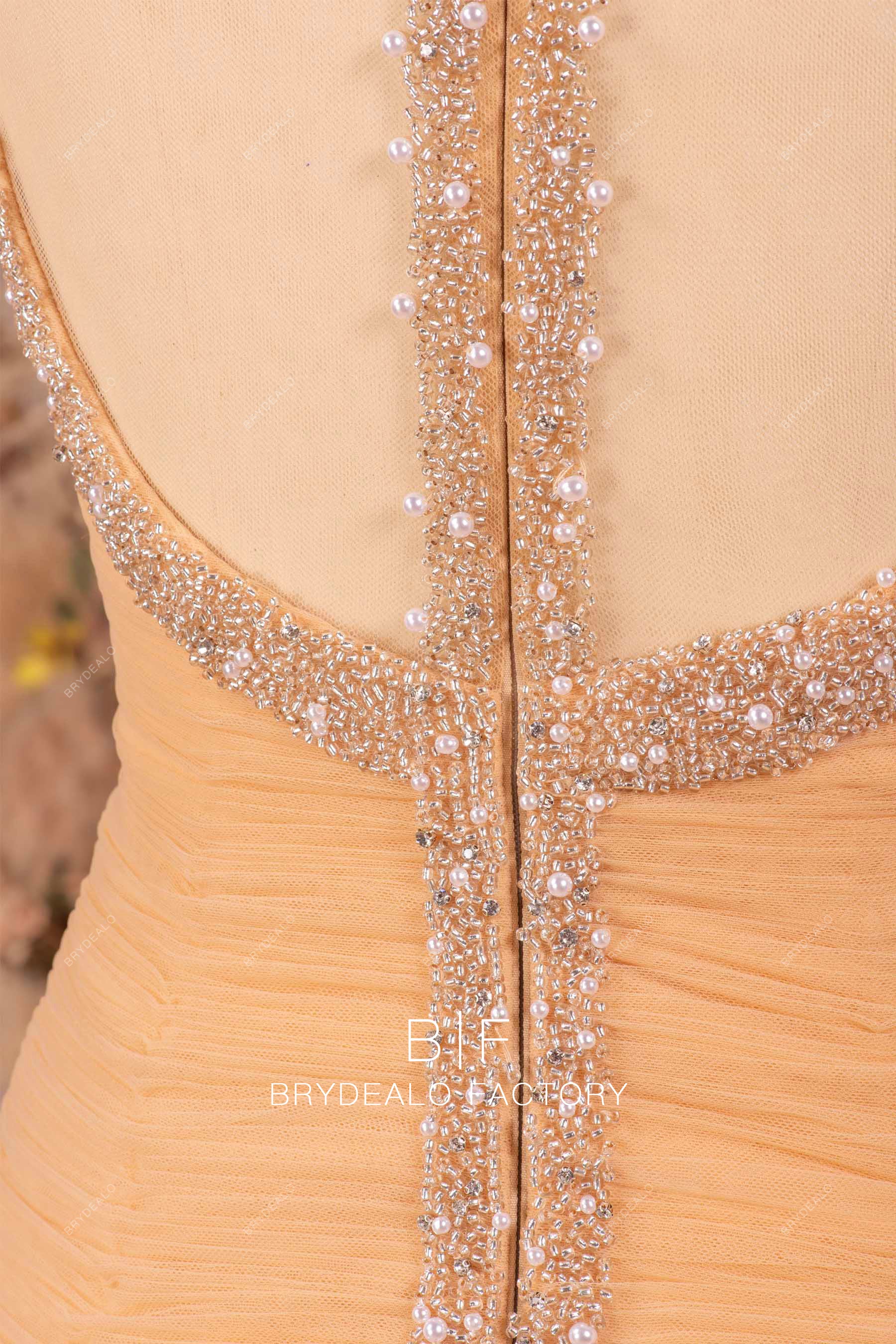 hand-sewn beaded wedding gown
