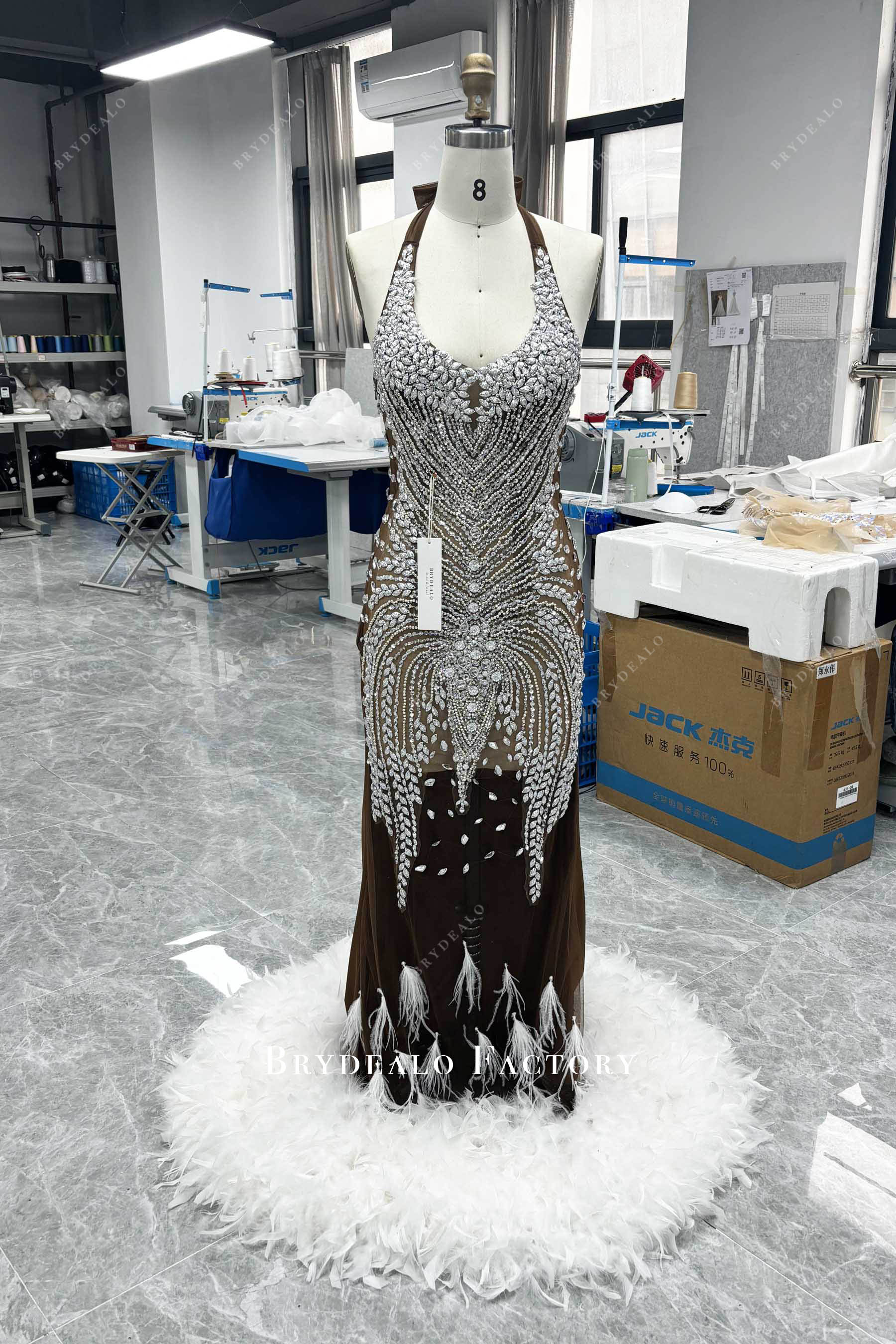 hand-sewn rhinestone feather prom dress