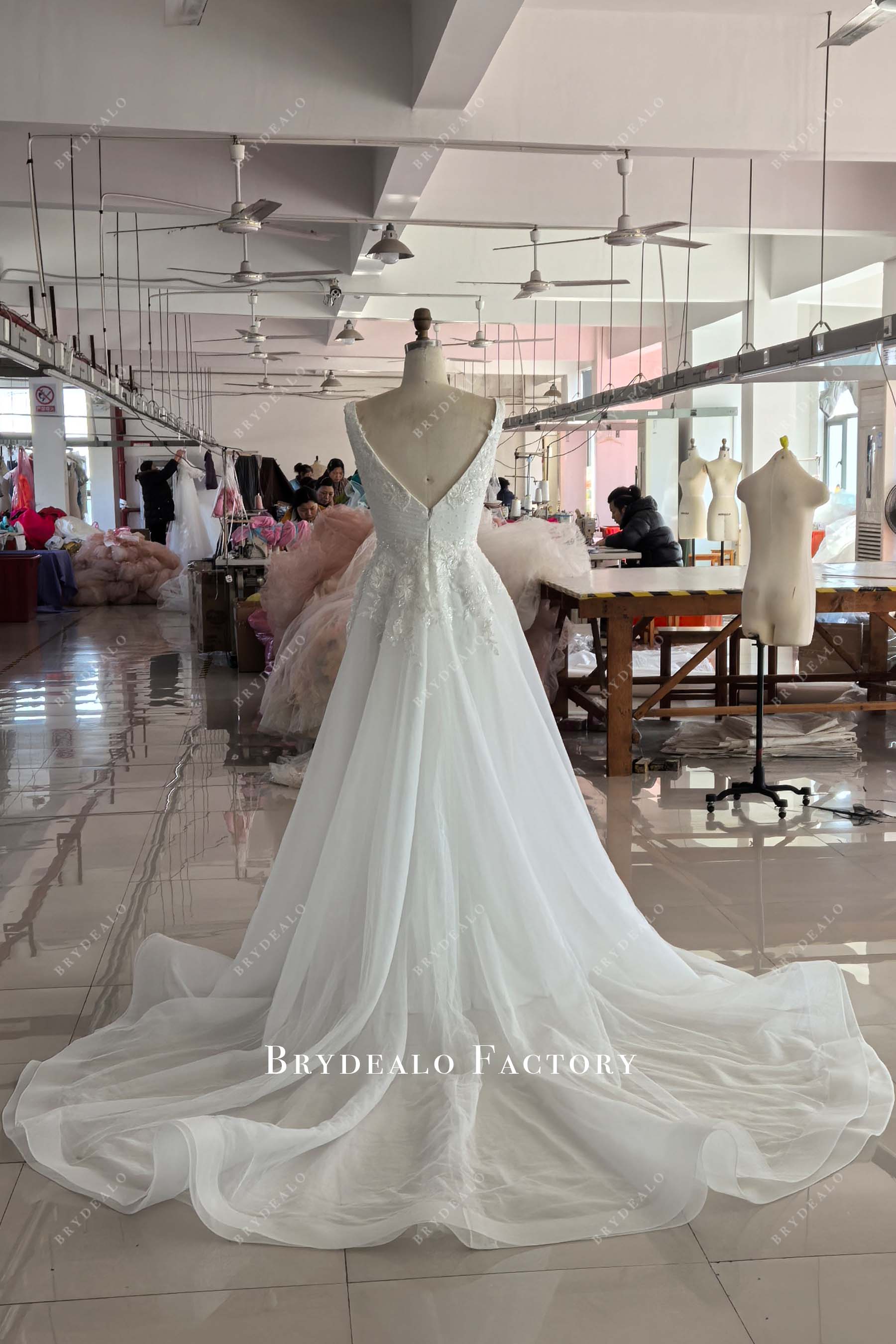 horsehair chapel train A-line wedding dress