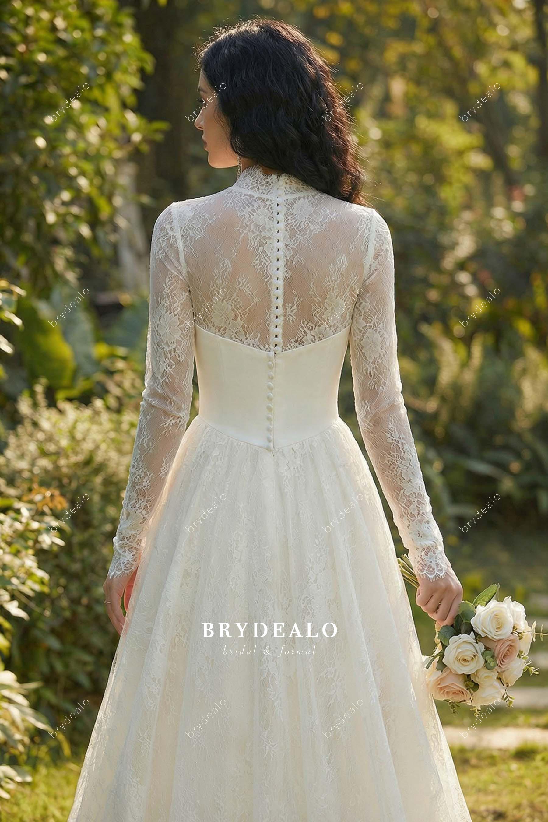 illusion lace buttoned back bridal dress