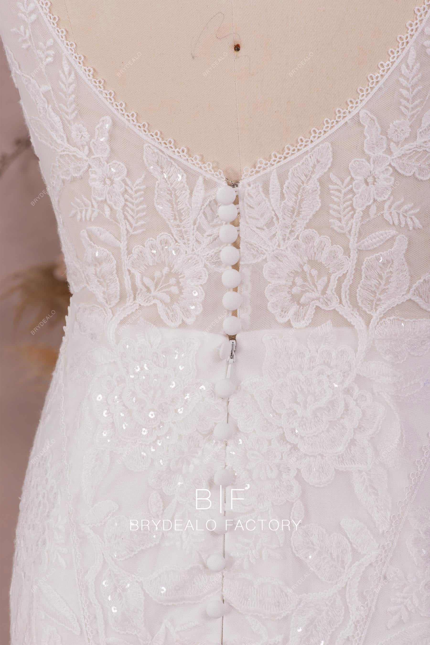 illusion lace buttoned back wedding gown