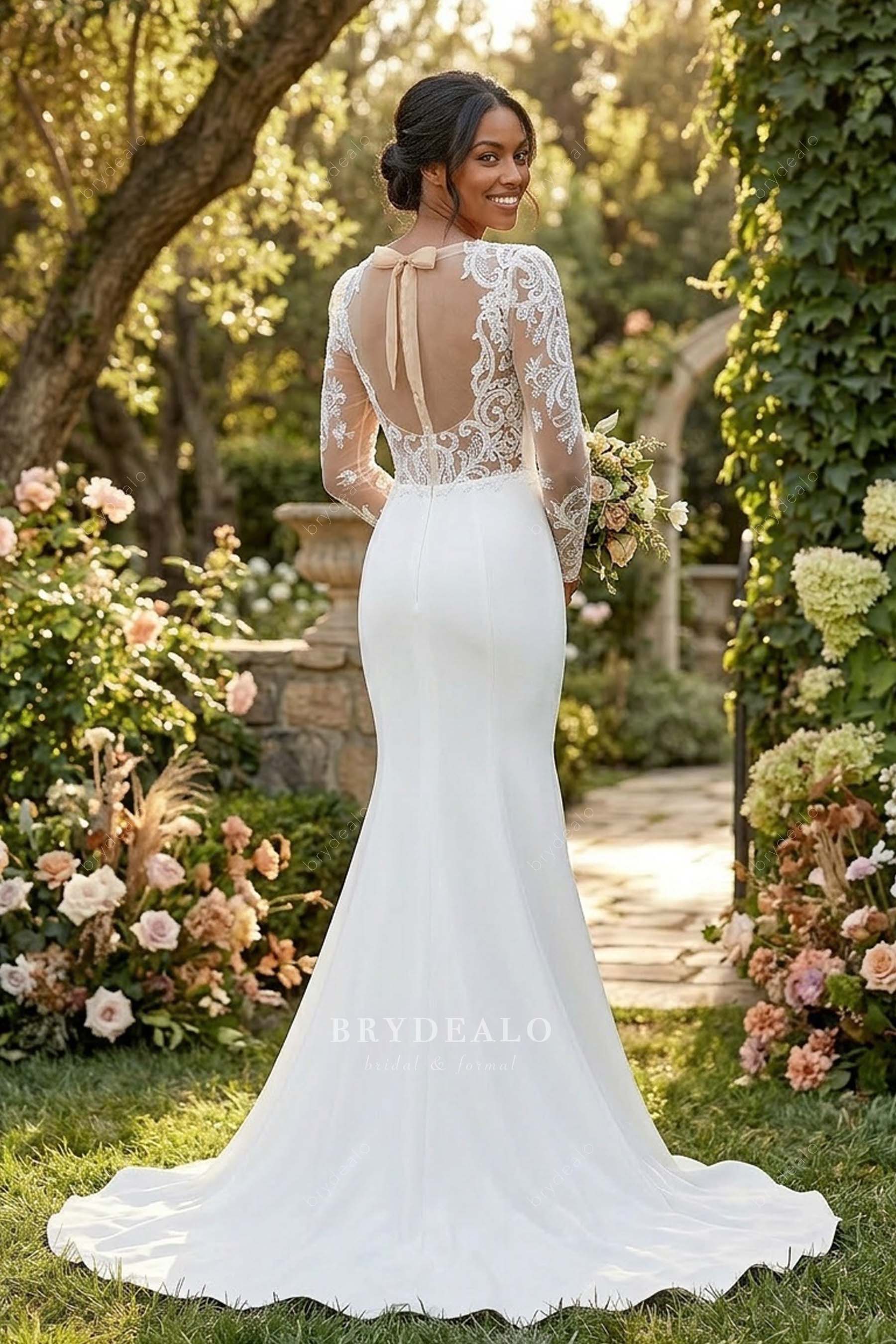 illusion long sleeve crepe bridal gown