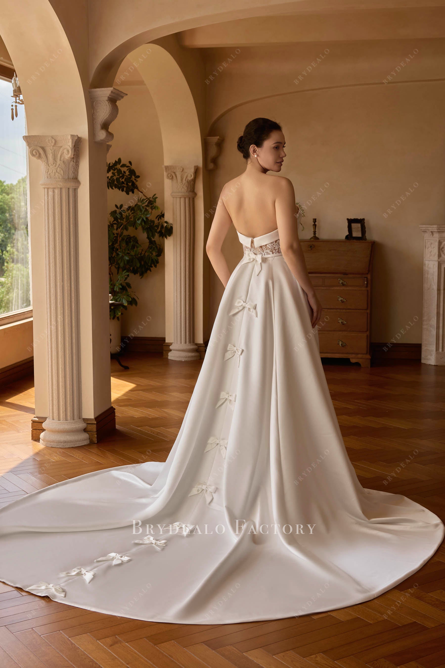 knot back train wedding dress