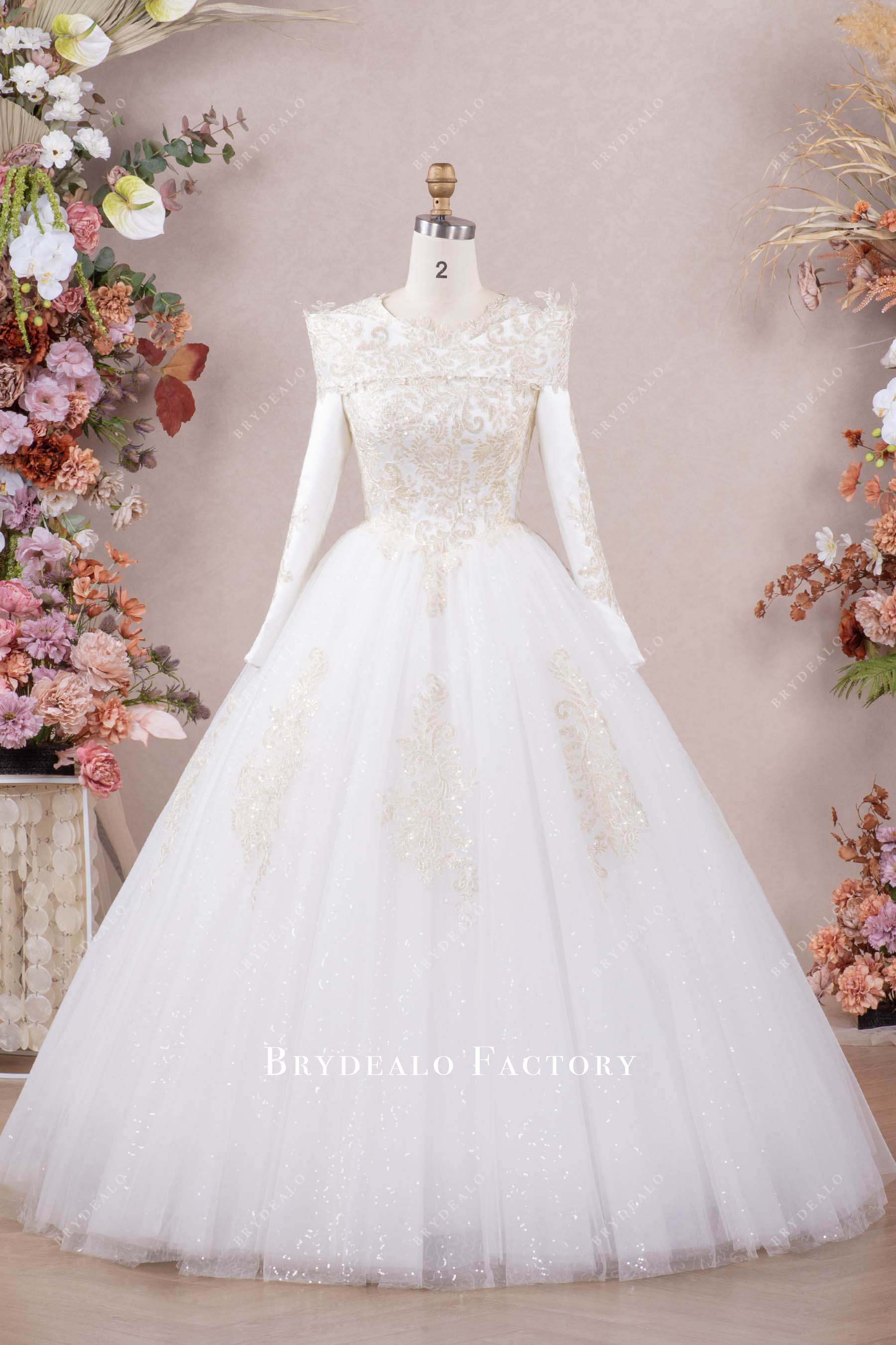 lace wrap puffy glitter wedding gown