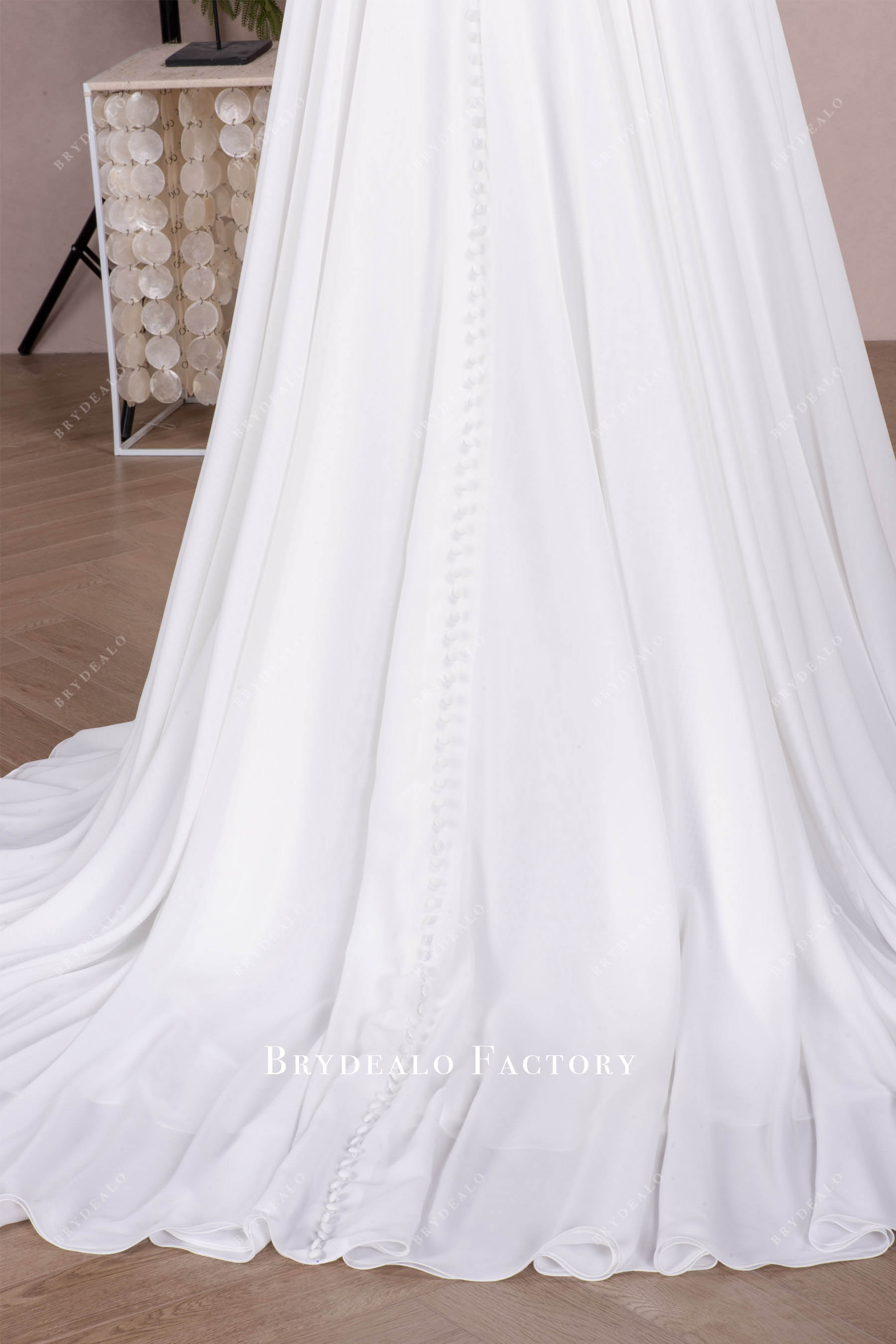 long buttoned train wedding dress