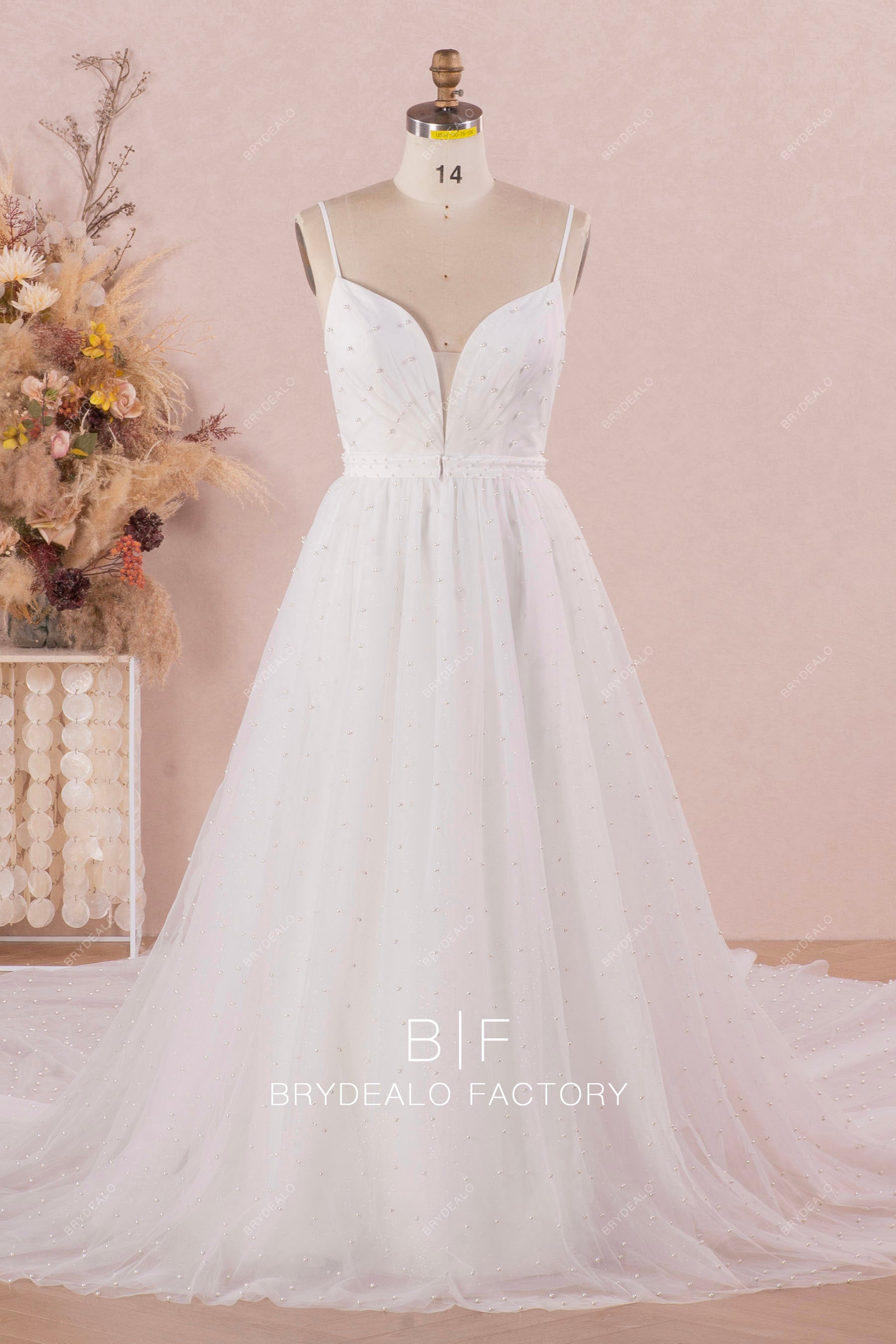 luxury pearl bridal gown with detachable long overskirt