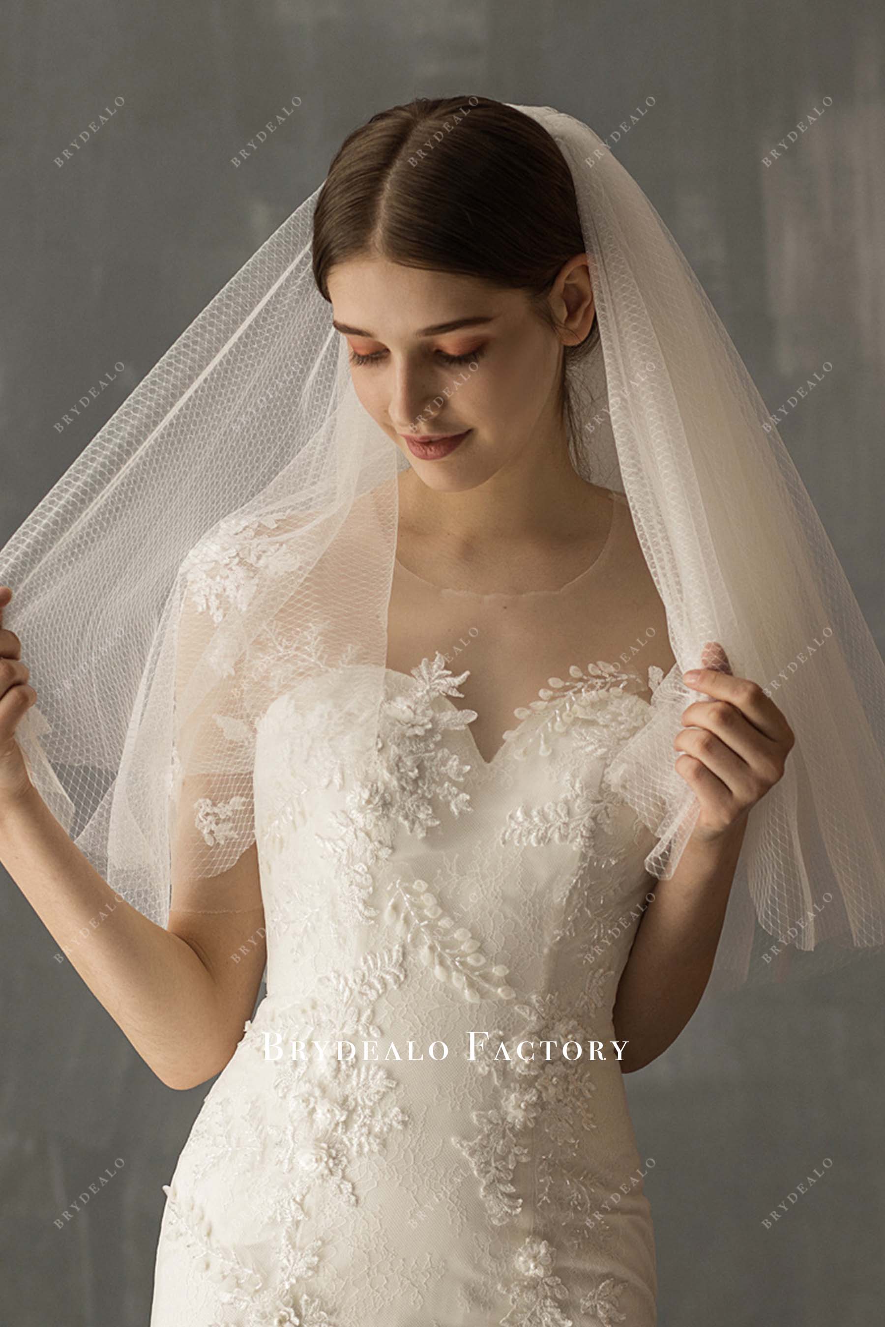 multi layered with comb bridal veil