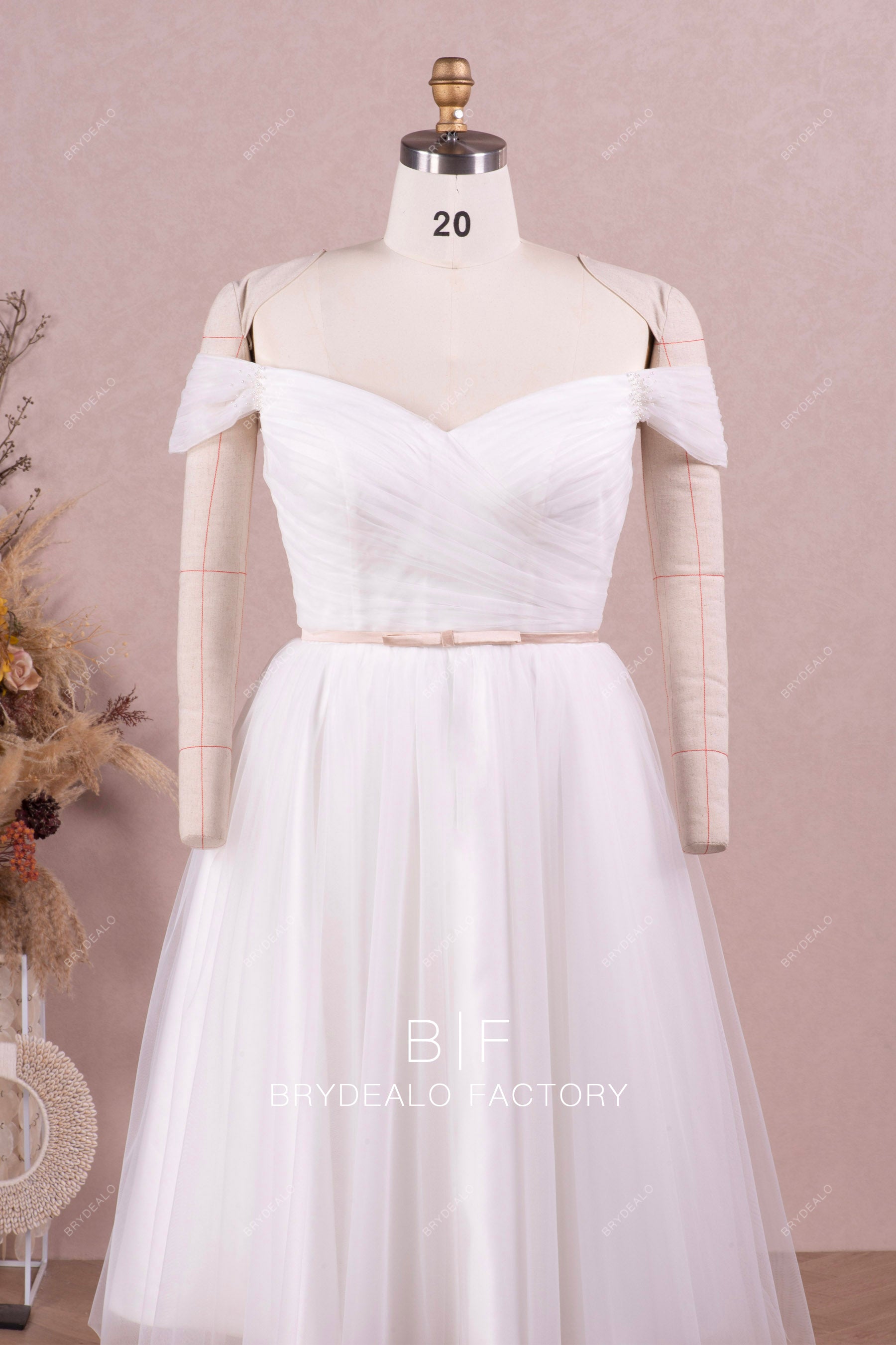 off shoulder pleated wedding dress