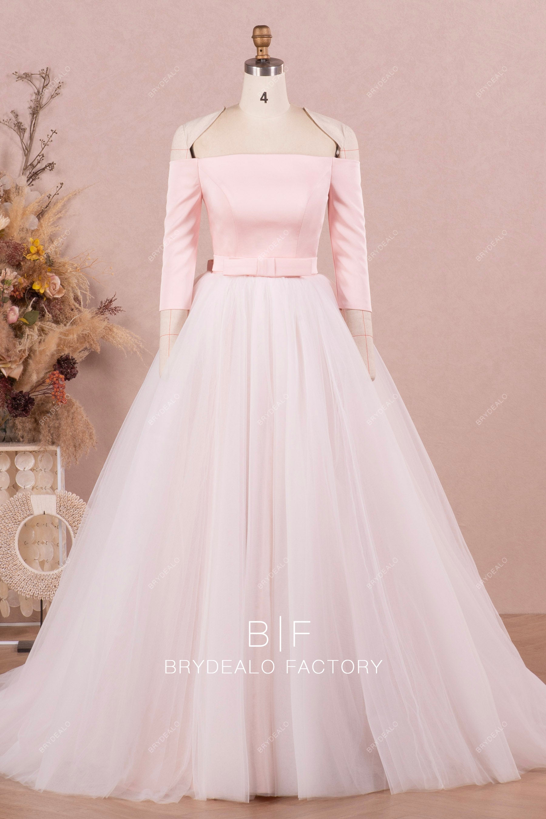 off shoulder sleeved wedding dress with puffy overskirt