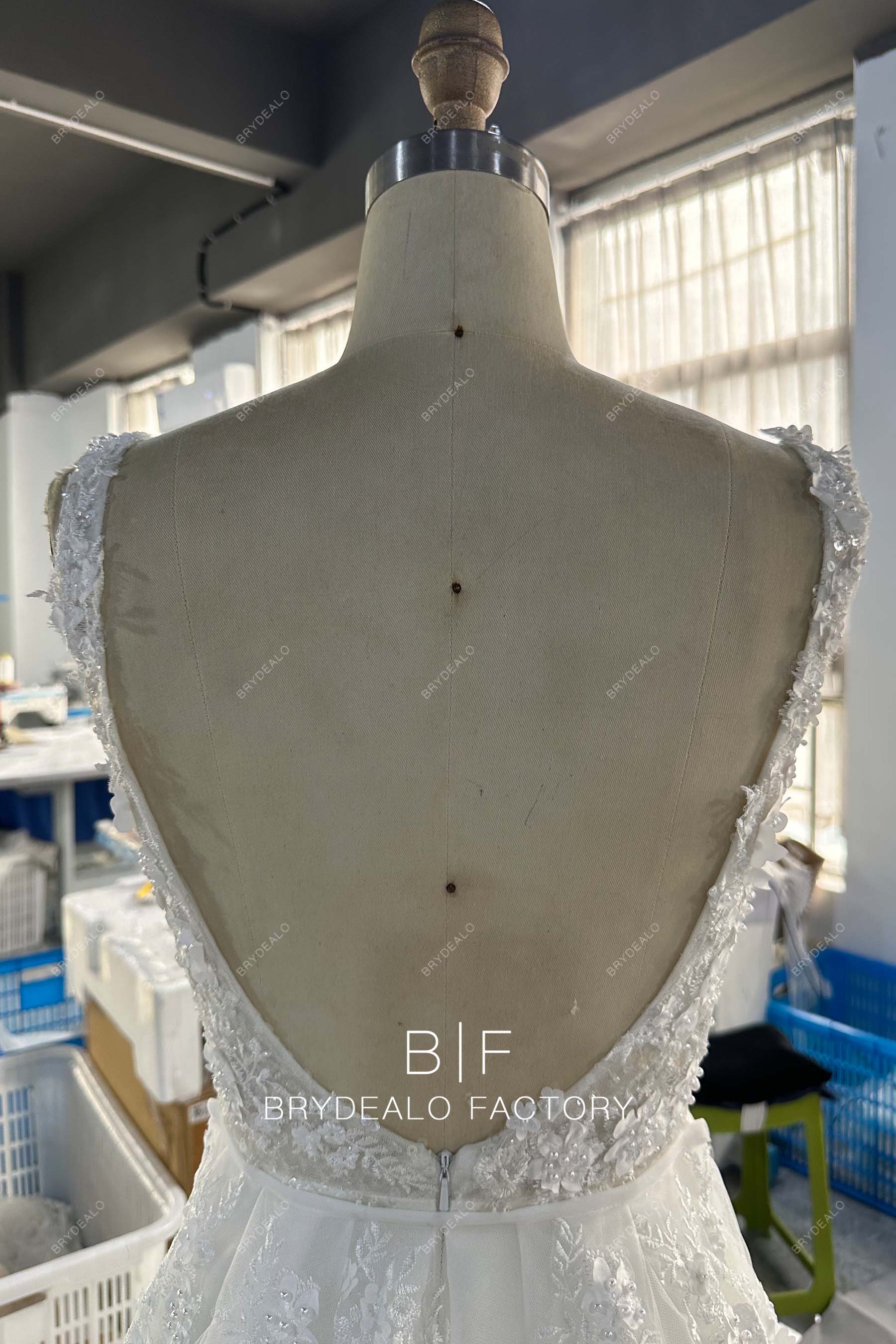 designer open back sleeveless wedding gown