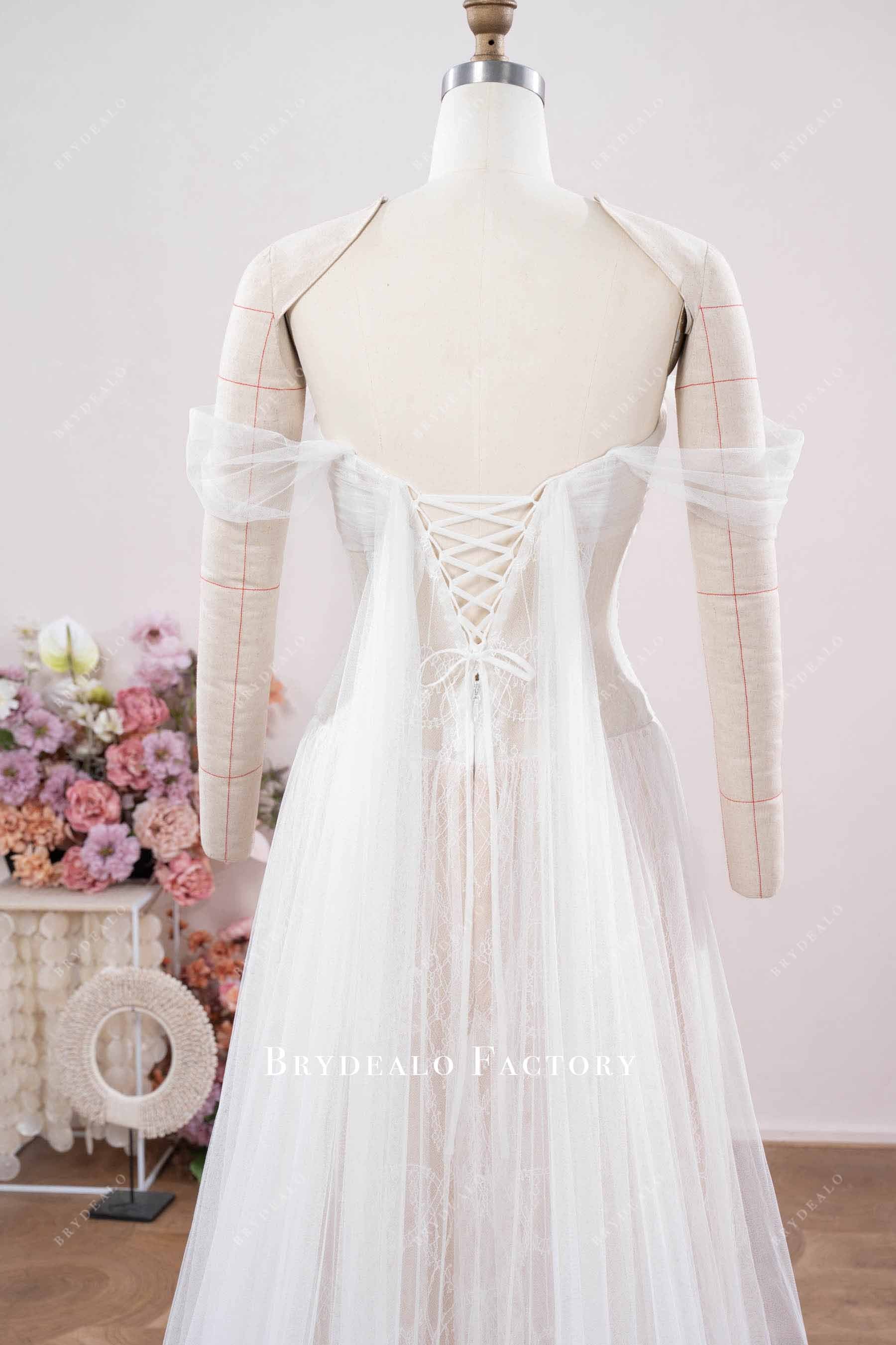 pleated tulle back panel bridal gown