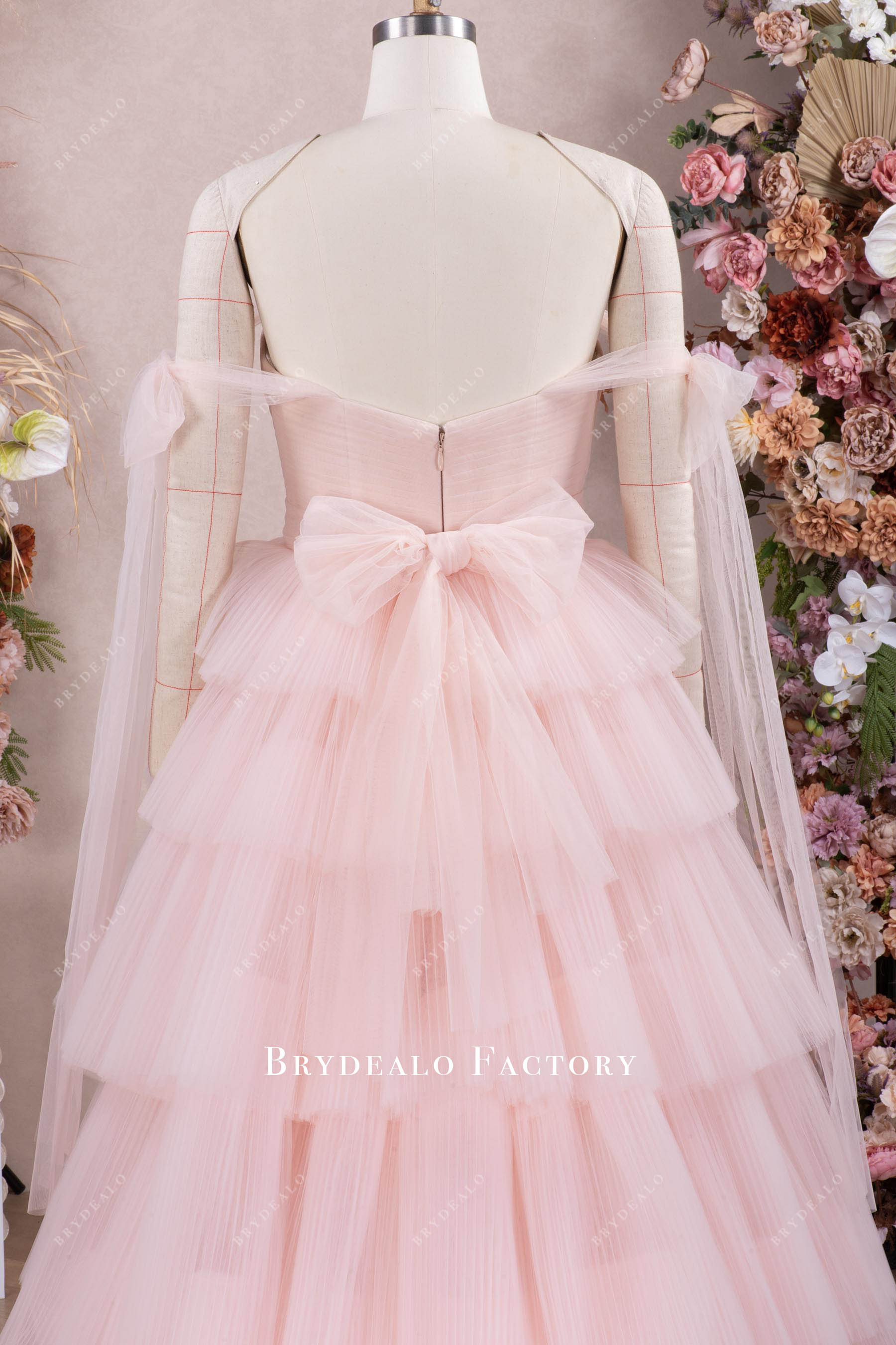 pleated tulle blushing wedding gown