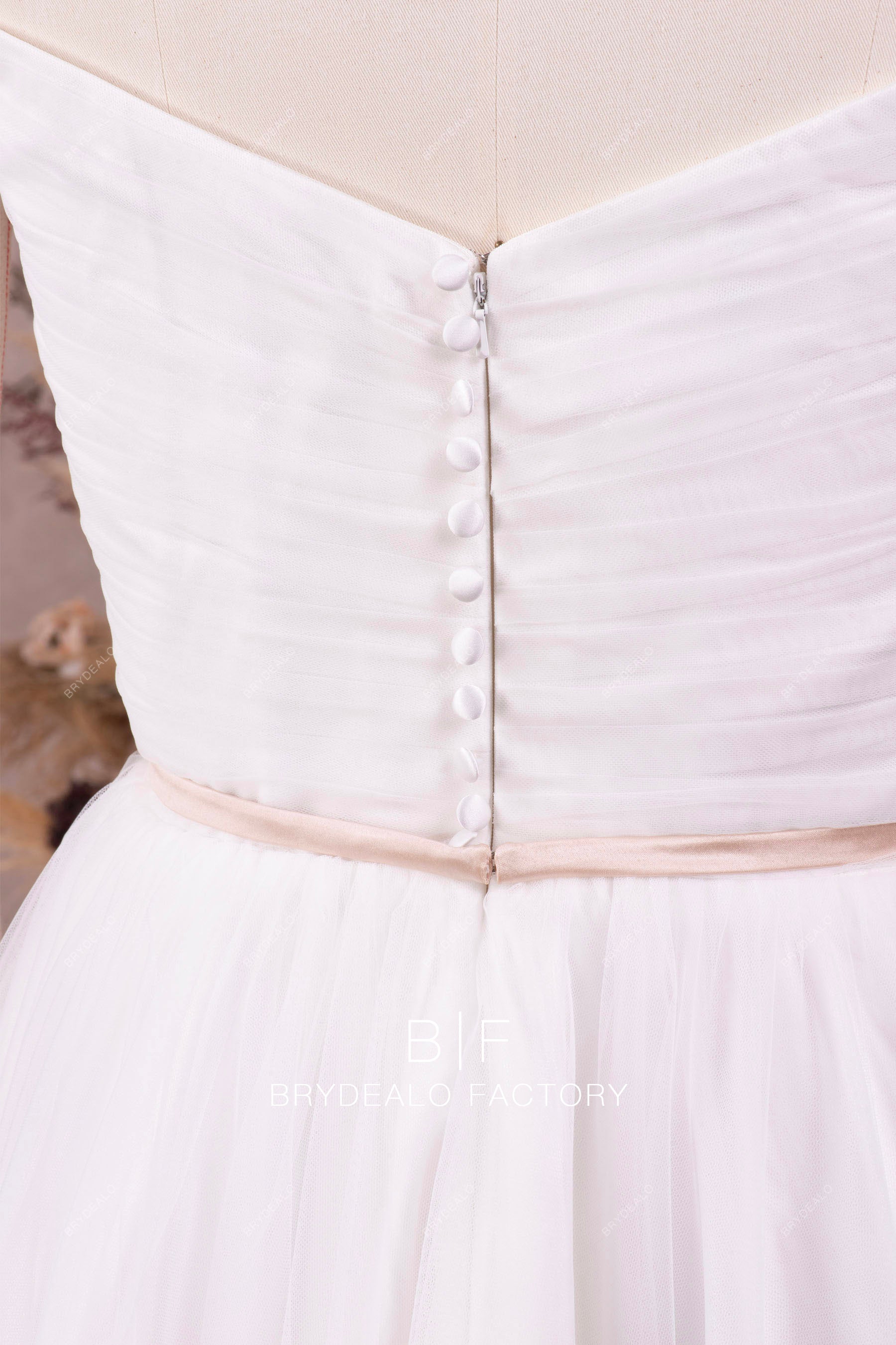 pleated tulle buttoned back wedding dress
