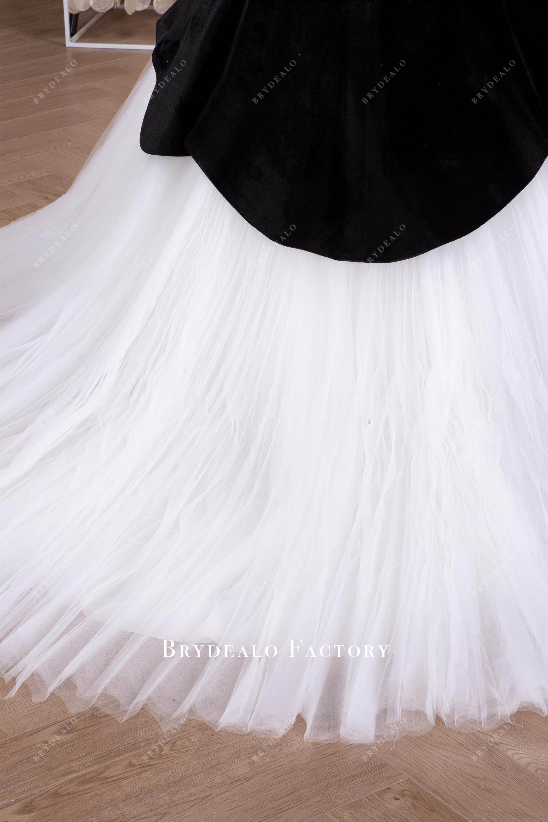 pleated white tulle bridal gown