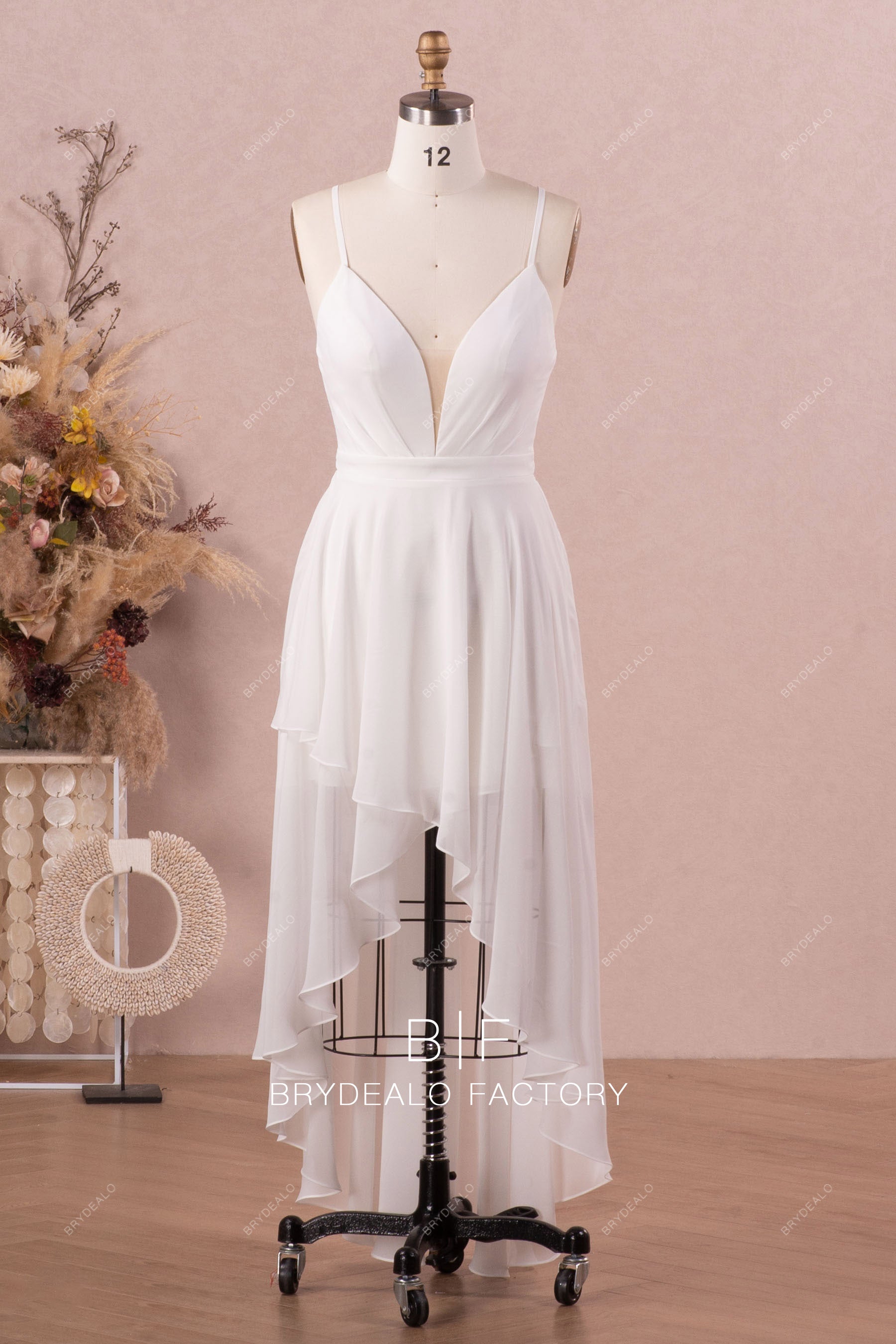plunging neck flowing beach wedding dress