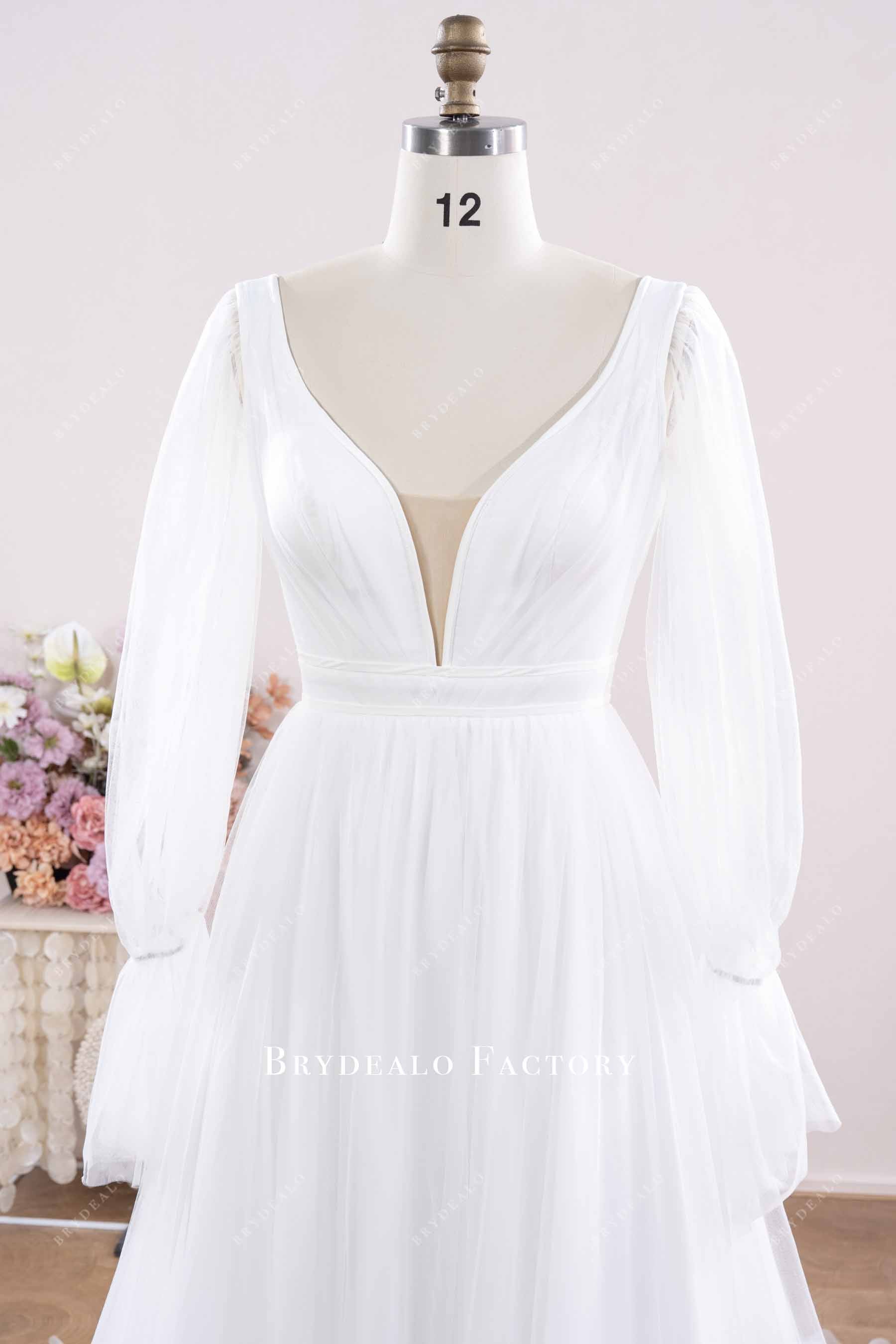 plunging neck sleeved wedding dress