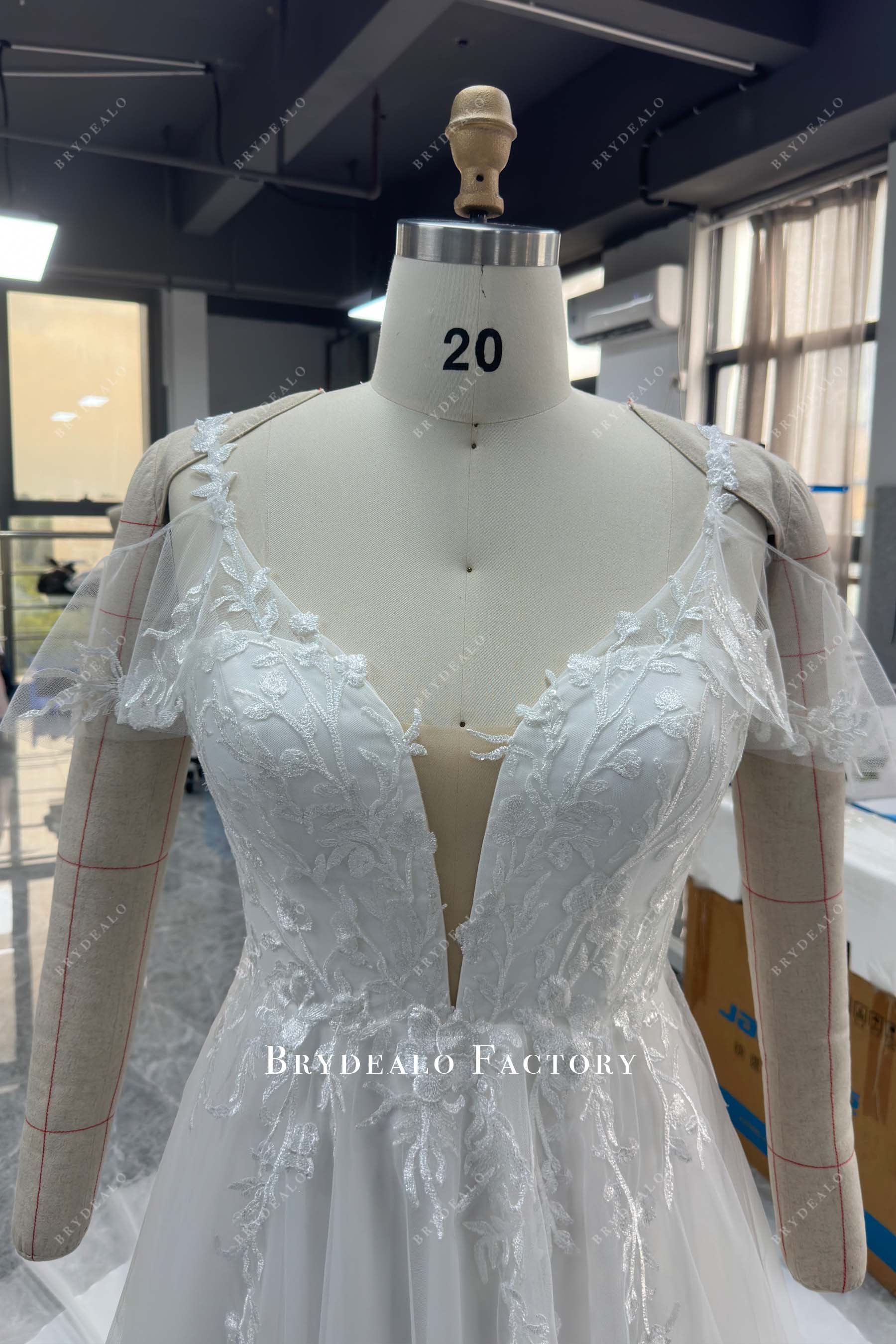 designer flutter sleeves wedding gown