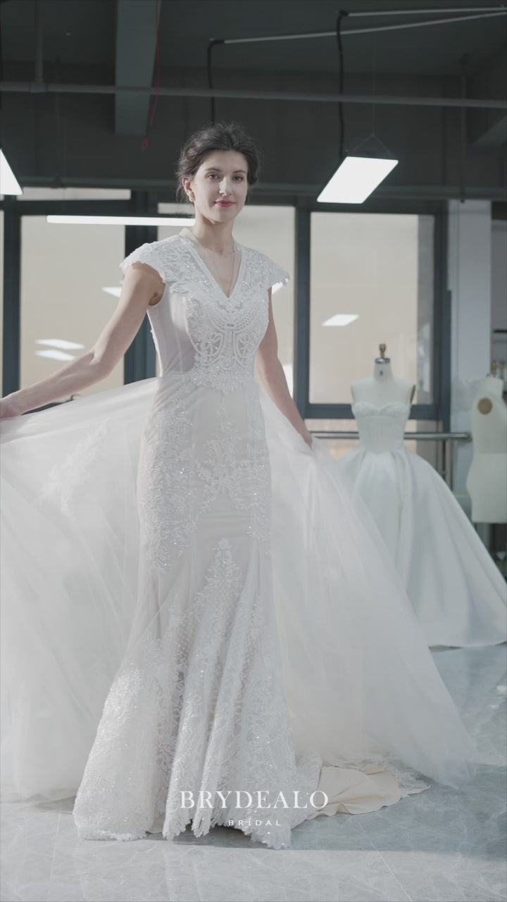 luxury beaded cap sleeve overskirt wedding dress