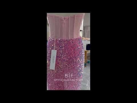 sparkly pink corset slit feather prom dress