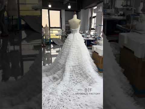 fairy-tale ruffled tulle ballgown wedding dress