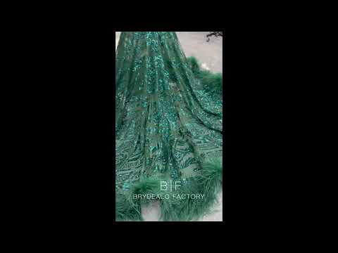 dark green sequin feather prom dress