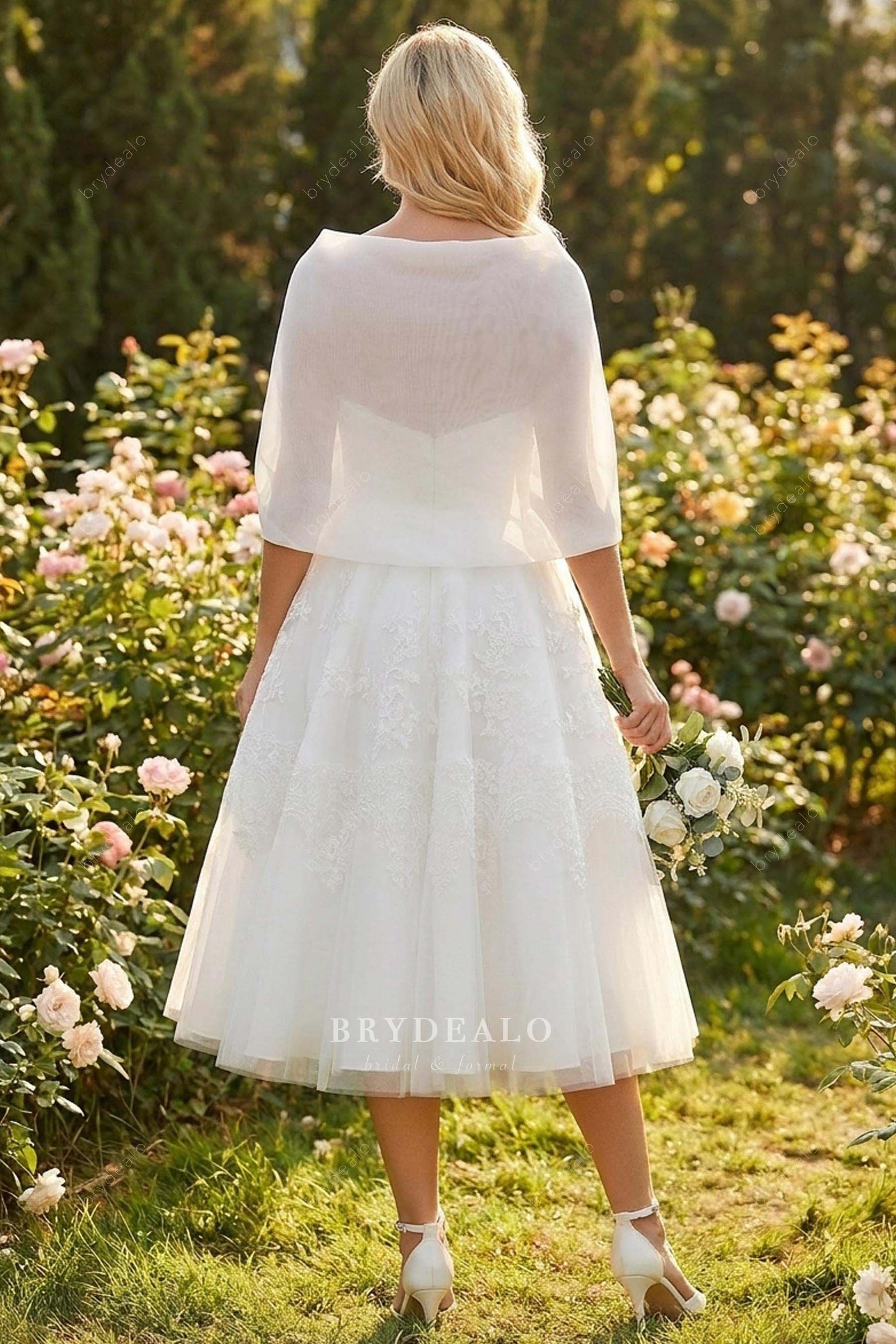 puffy A-line open back wedding dress
