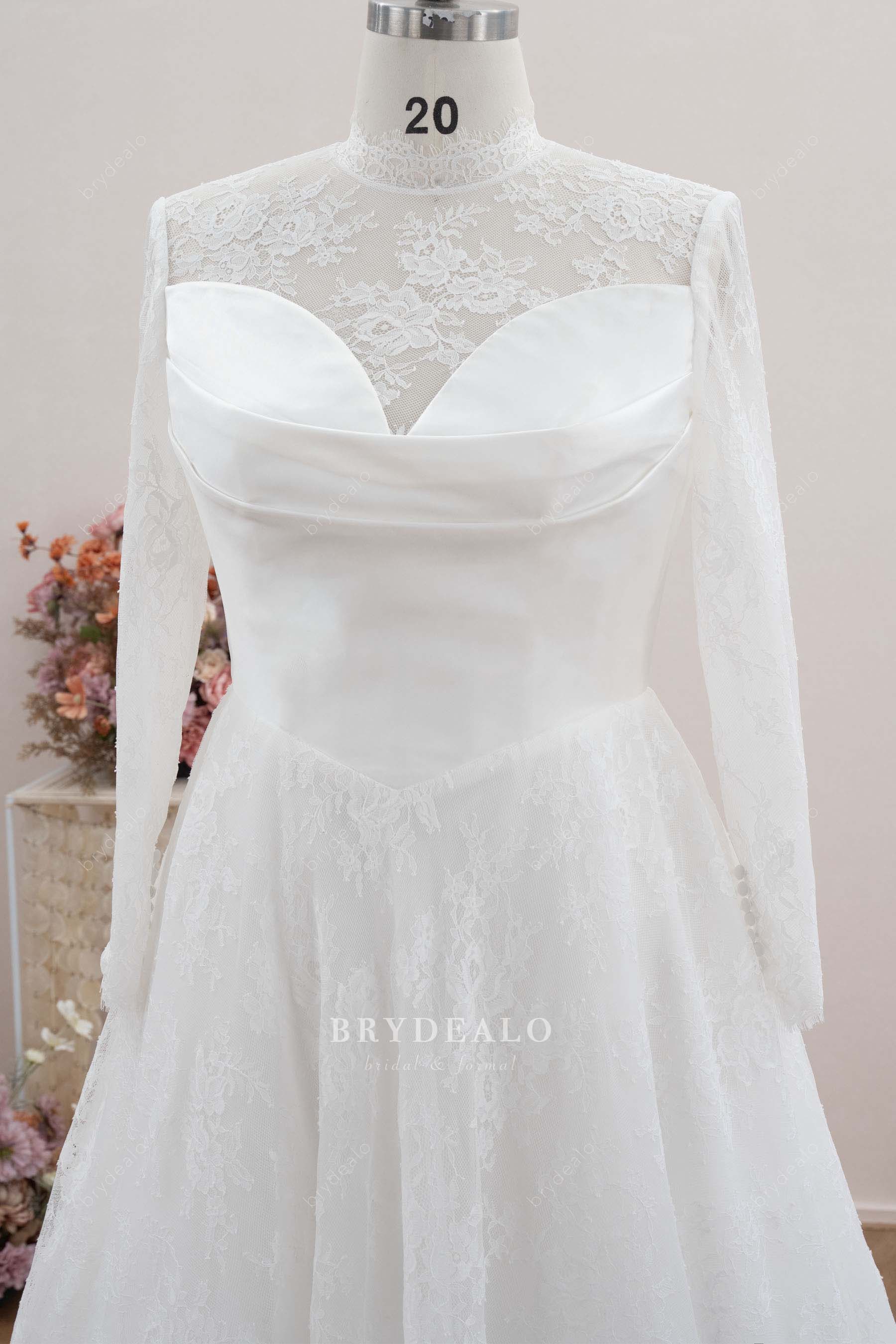 ruched satin bodice sleeved wedding dress