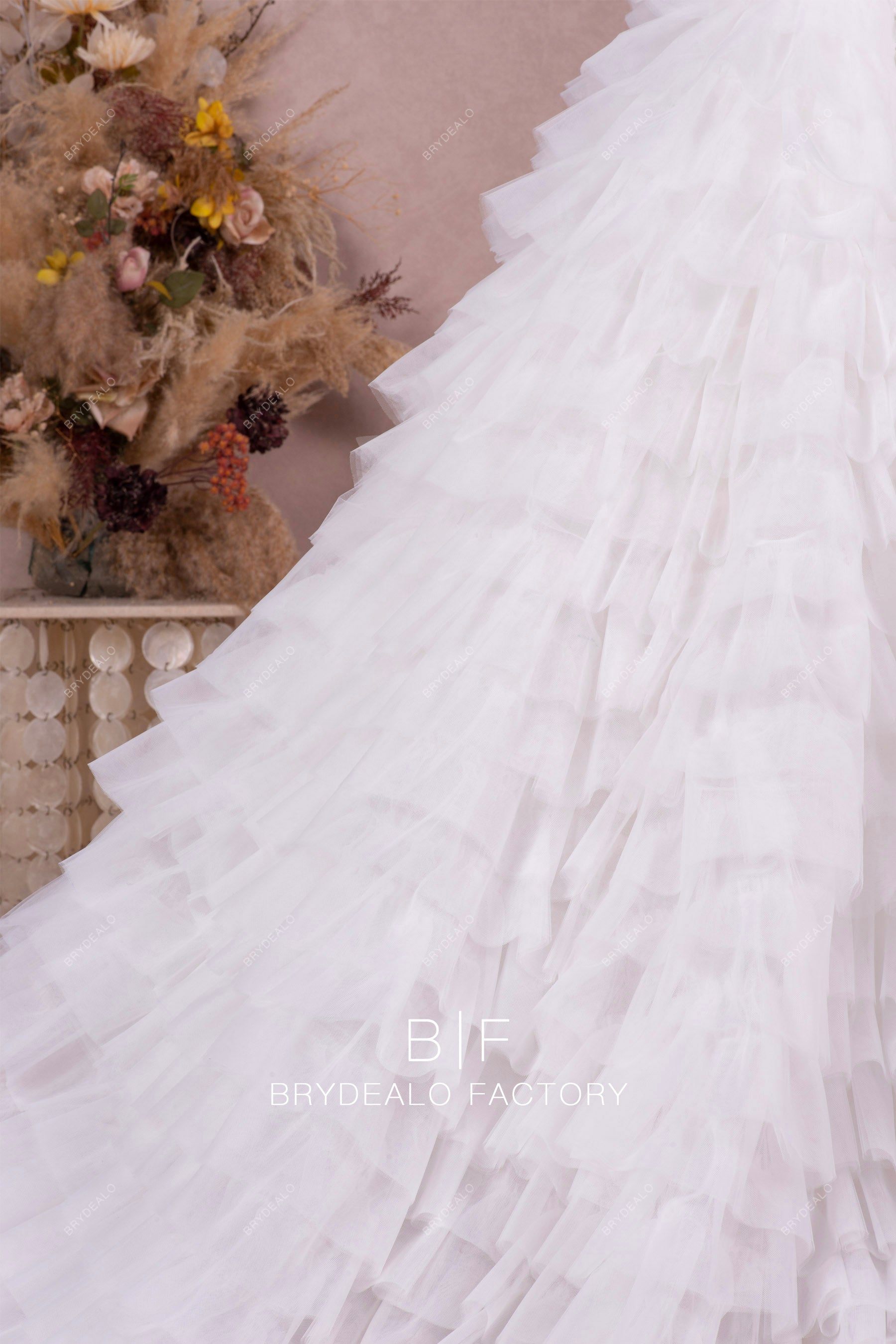 ruffled tulle skirt wedding dress