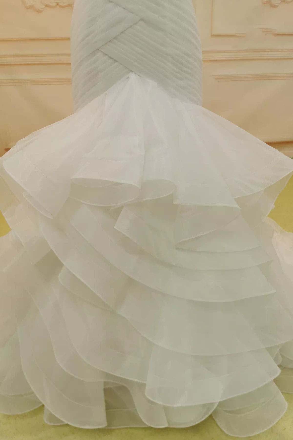 ruffled tulle trumpet wedding dress